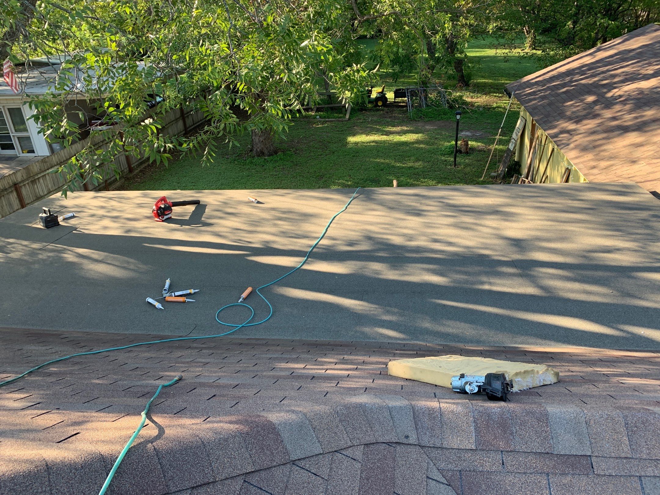 Residential Roofing Installation using Modified Bitumen Roll Roofing by Harvey Roofing & Construction
