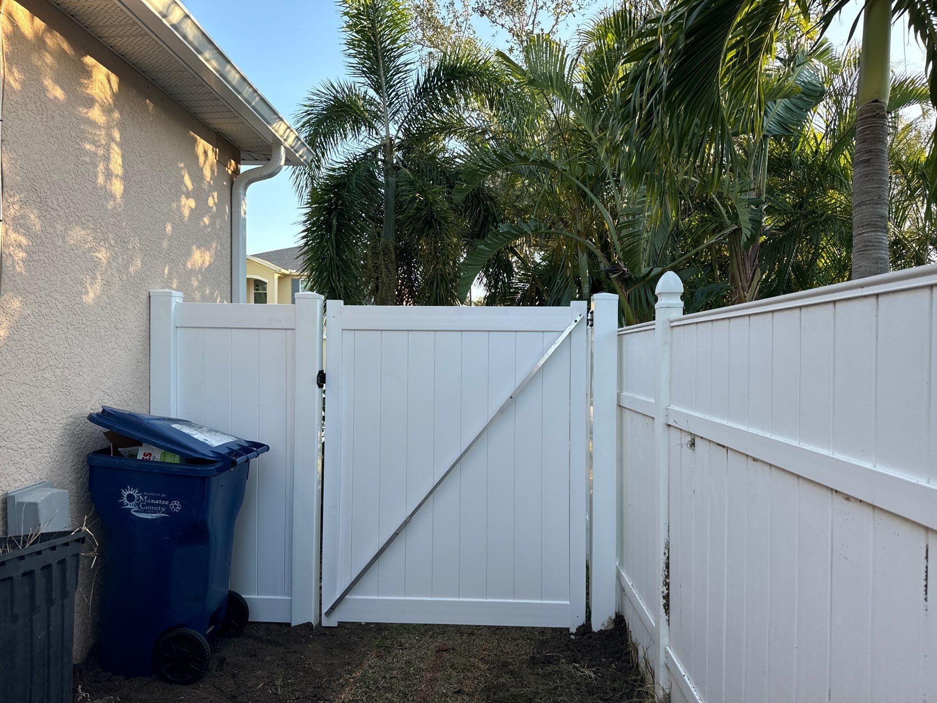 Vinyl Picket Fence Installation using 6Ft White Vinyl Privacy Fence with a 4Ft White Clearwater Picket Fence by Asap fence and gates, LLC