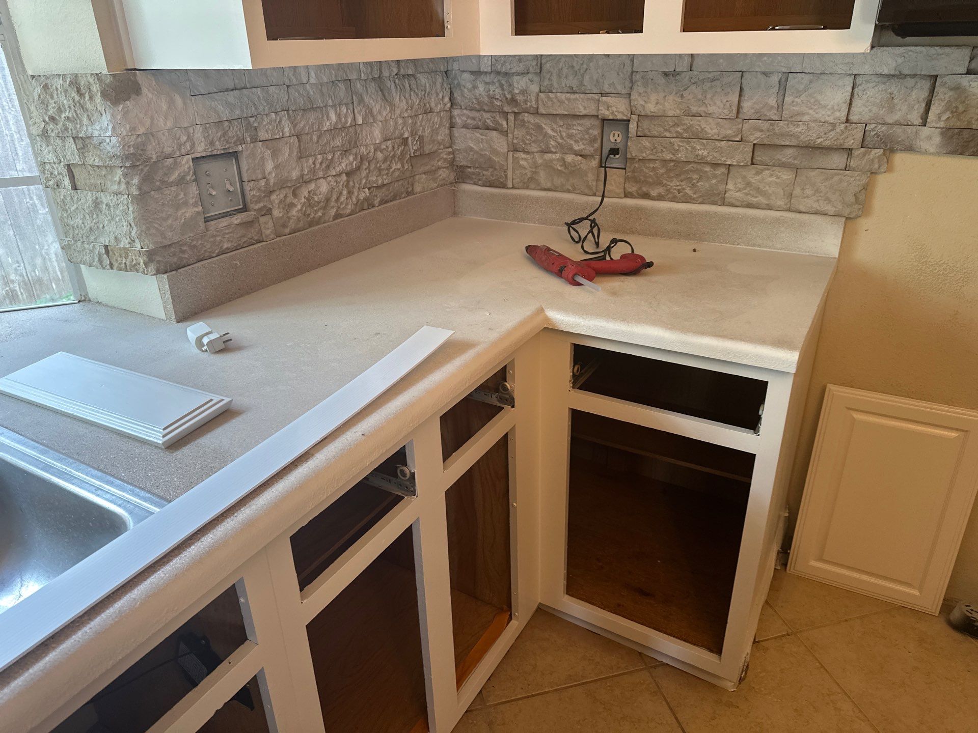 Removed the old stone bulky look for a new fresh upgrade with new Quartz countertops by Mena stone surfaces