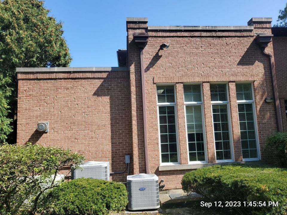 natural stone using Algaecide, soft wash soap by Northern Power Washing LLC.
