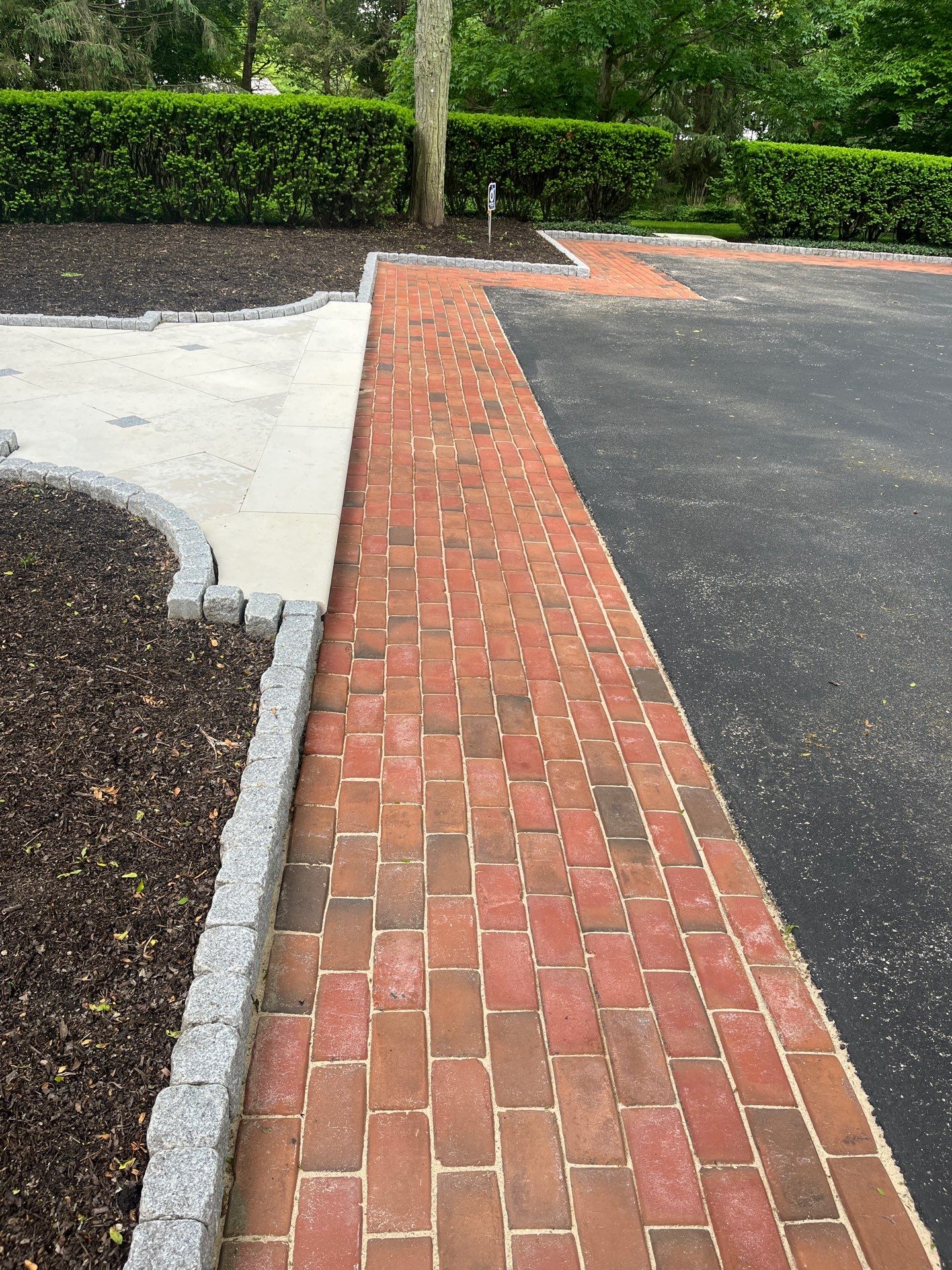 Brick paver clean, sand and seal.  using Algaecide, soft wash soap by Northern Power Washing LLC.