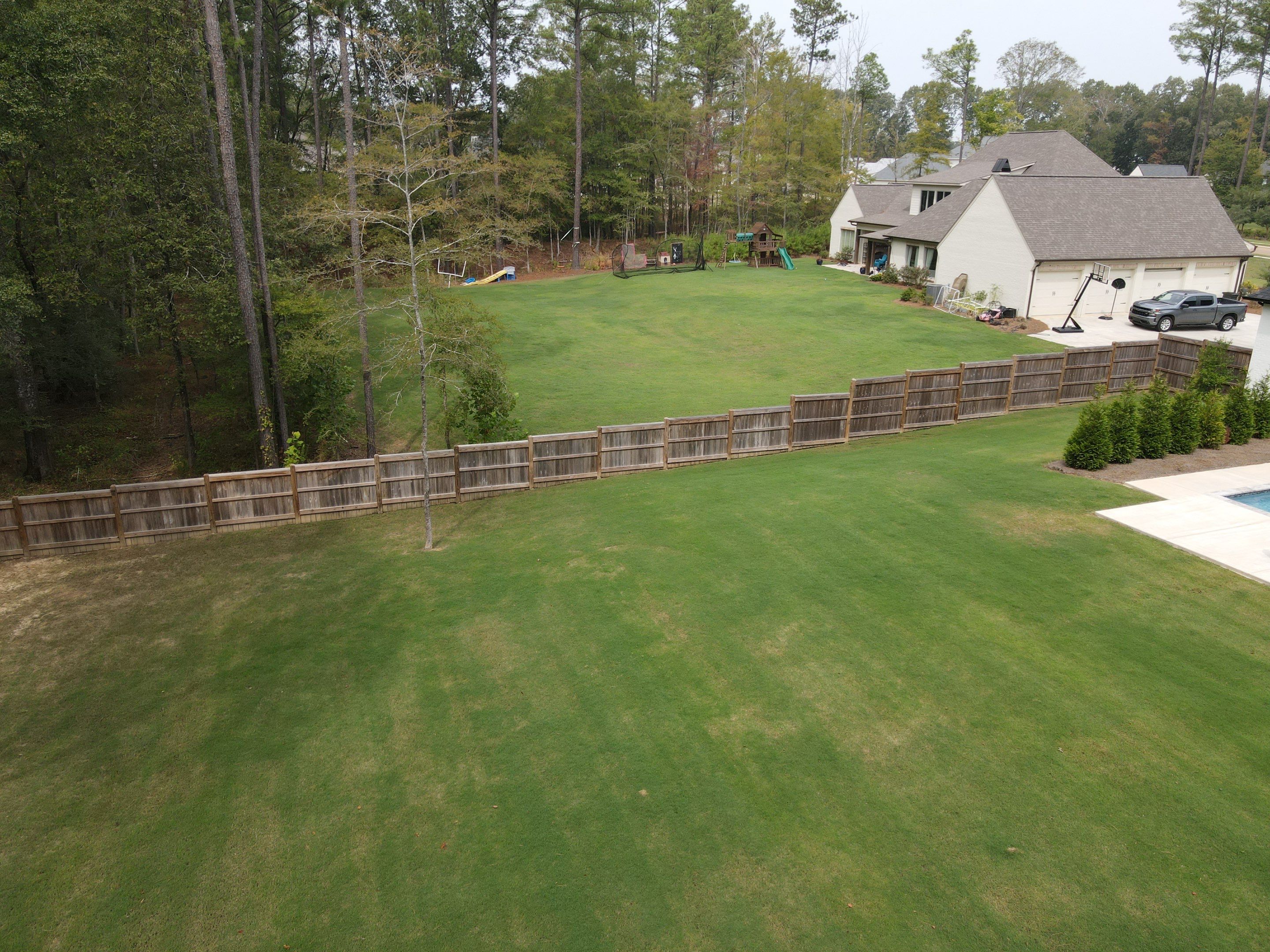 Fence Stain using Wood Defender Black  by Roberson Construction LLC