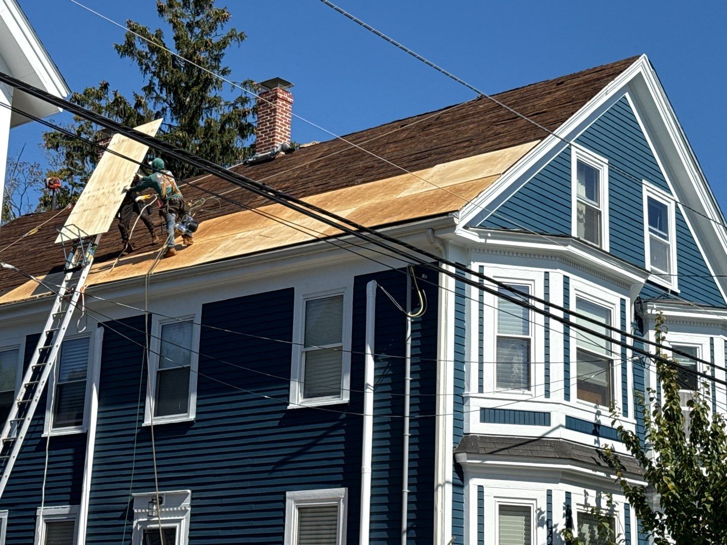 Half Roof Replacement for Solar Installation – Townhouse with New Plywood Decking by Sensible Home Solutions