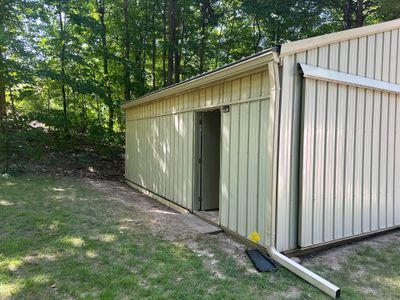 Custom Gutter and Downspout Installation for Traverse City Outbuilding