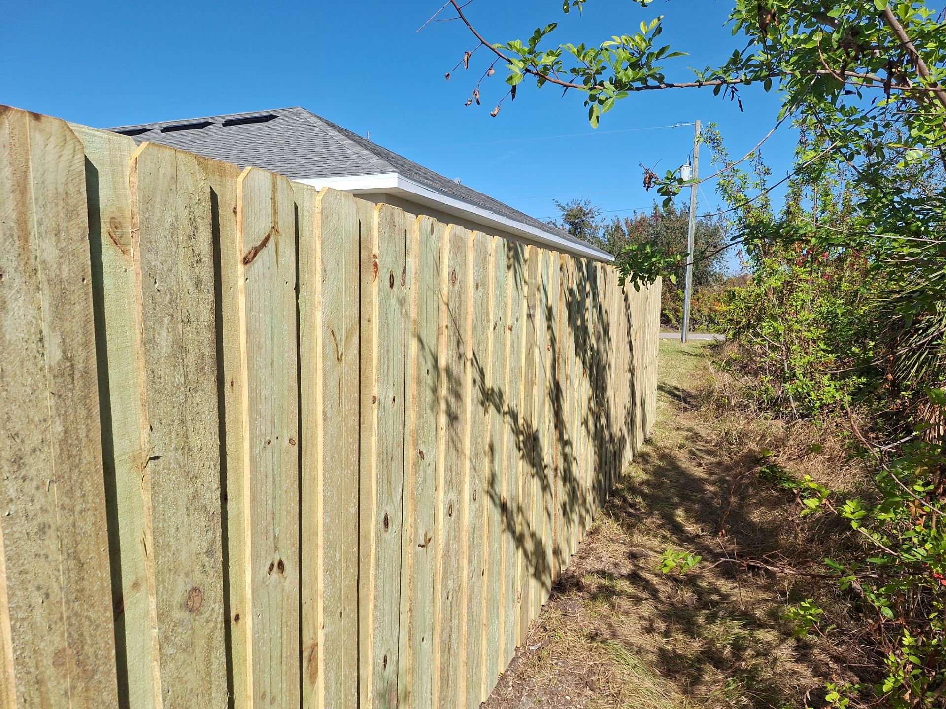 Wood Fence Installation using 6Ft Pressure Treated Wood Board On Board Privacy Fence by Asap fence and gates, LLC