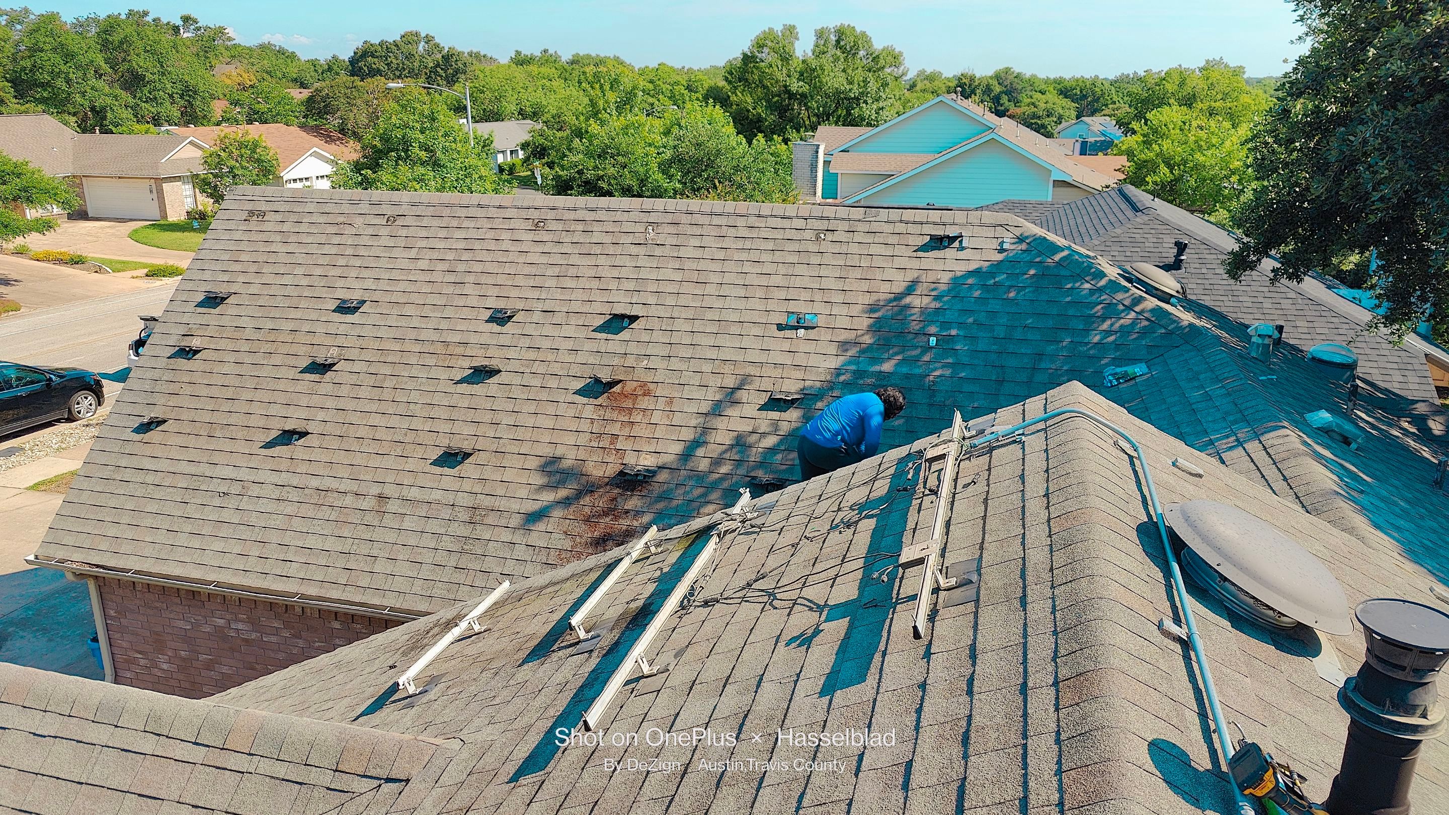 Residential Roofing Installation using IKO Dynasty Class 3 IR Granite Black by DeZign Roofing & Exteriors