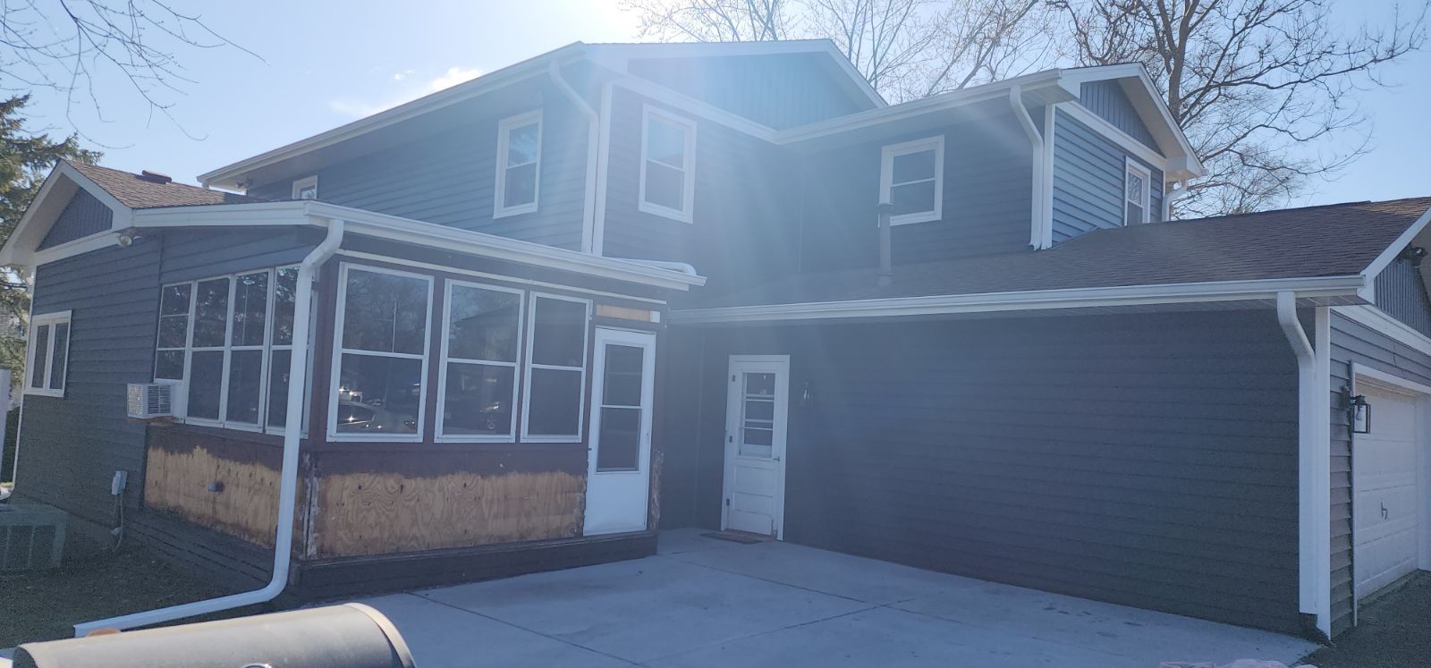 Vinyl siding replacement using CertainTeed Monogram double 5" vinyl siding  by AJ Exteriors & Roofing Inc.