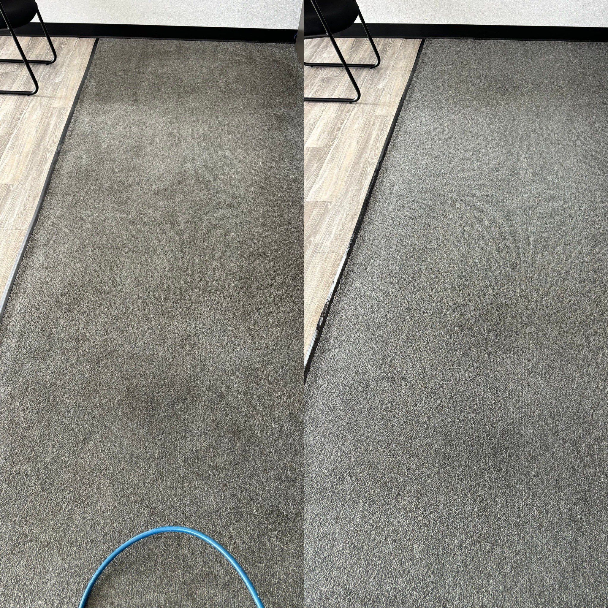 the service being done is carpet cleaning on a grey carpet surface removing dirt and stains for a fresh appearance