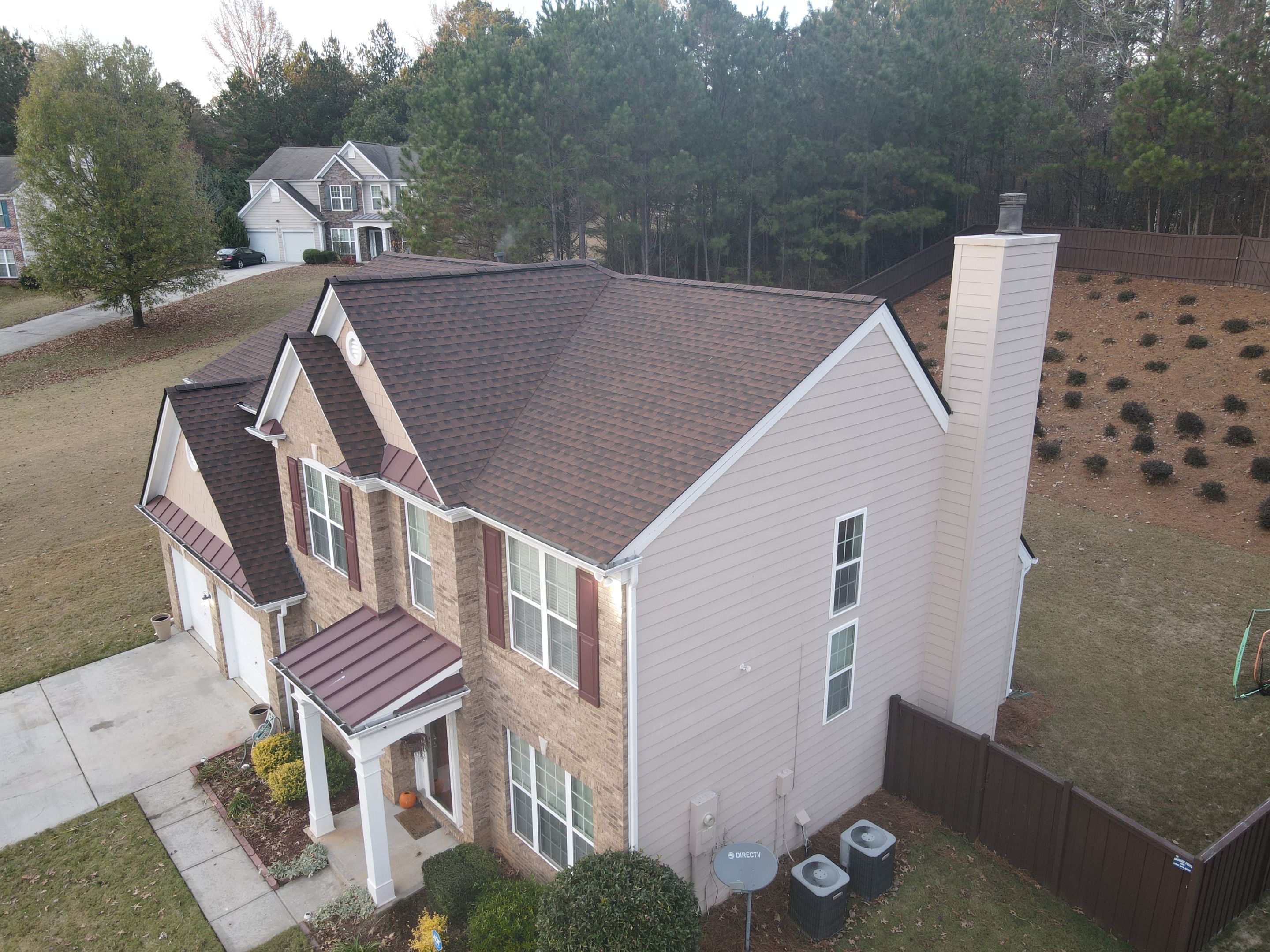 Residential Roofing Installation using Timberline HDZ Hickory  by Inspector Roofing and Restoration