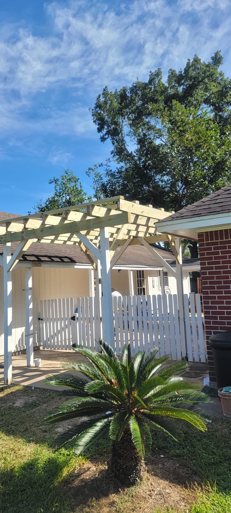 🌿 Rodney – Full Gutters, Drainage System, Flagstone Patio & Pergola  Alejandro and the Texas Urban Elements Team recently completed a multi-solution project for Rodney’s home, blending function with design.  ✅ Seamless Gutters We installed a complete 6” seamless gutter system around the home to properly redirect rainwater away from the foundation, protecting siding, paint, and landscaping while boosting curb appeal.  ✅ Drainage System A new PVC storm drainage system was integrated into the gutters and extended to carry roof runoff away from the house. This ensures water won’t pool near the foundation or the new patio area.  ✅ Flagstone Patio Ground We prepped, leveled, and installed a custom flagstone patio for Rodney—delivering both beauty and durability, creating a natural, timeless look that ties perfectly into the yard.  ✅ Pergola Addition To conclude, our framing team constructed a small pergola extension, providing Rodney’s patio with a shaded retreat for family and friends to enjoy.  ✨ Result: A fully protected and enhanced outdoor living space where drainage, stonework, and structure all work together for long-lasting performance and comfort.  📢 At Texas Urban Elements, we specialize in building solutions that protect homes while creating beautiful outdoor environments. by Texas Urban Elements