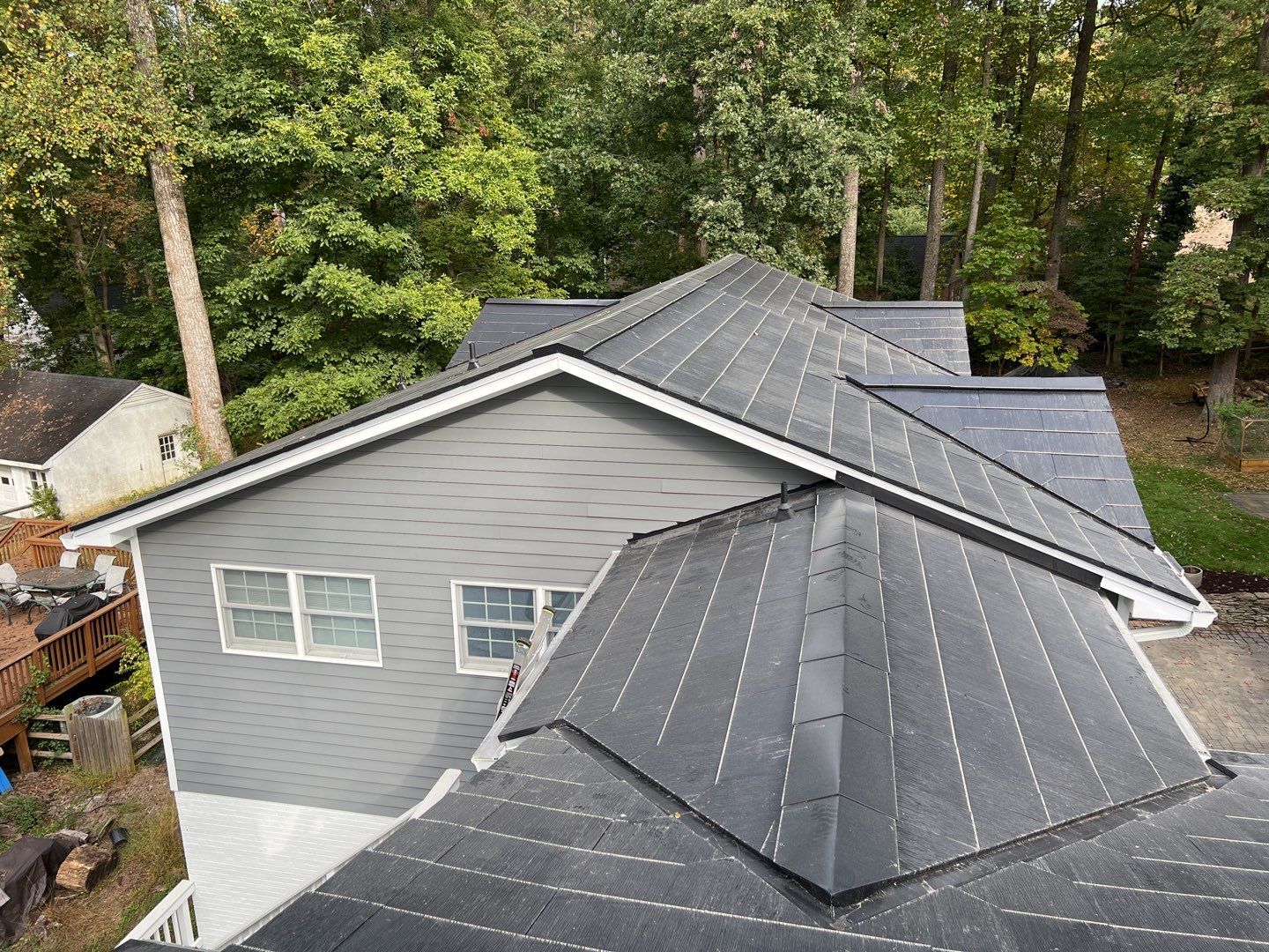 Tesla Solar Roof Replacement using Tesla Solar Roof V3 Tiles by American Home Contractors