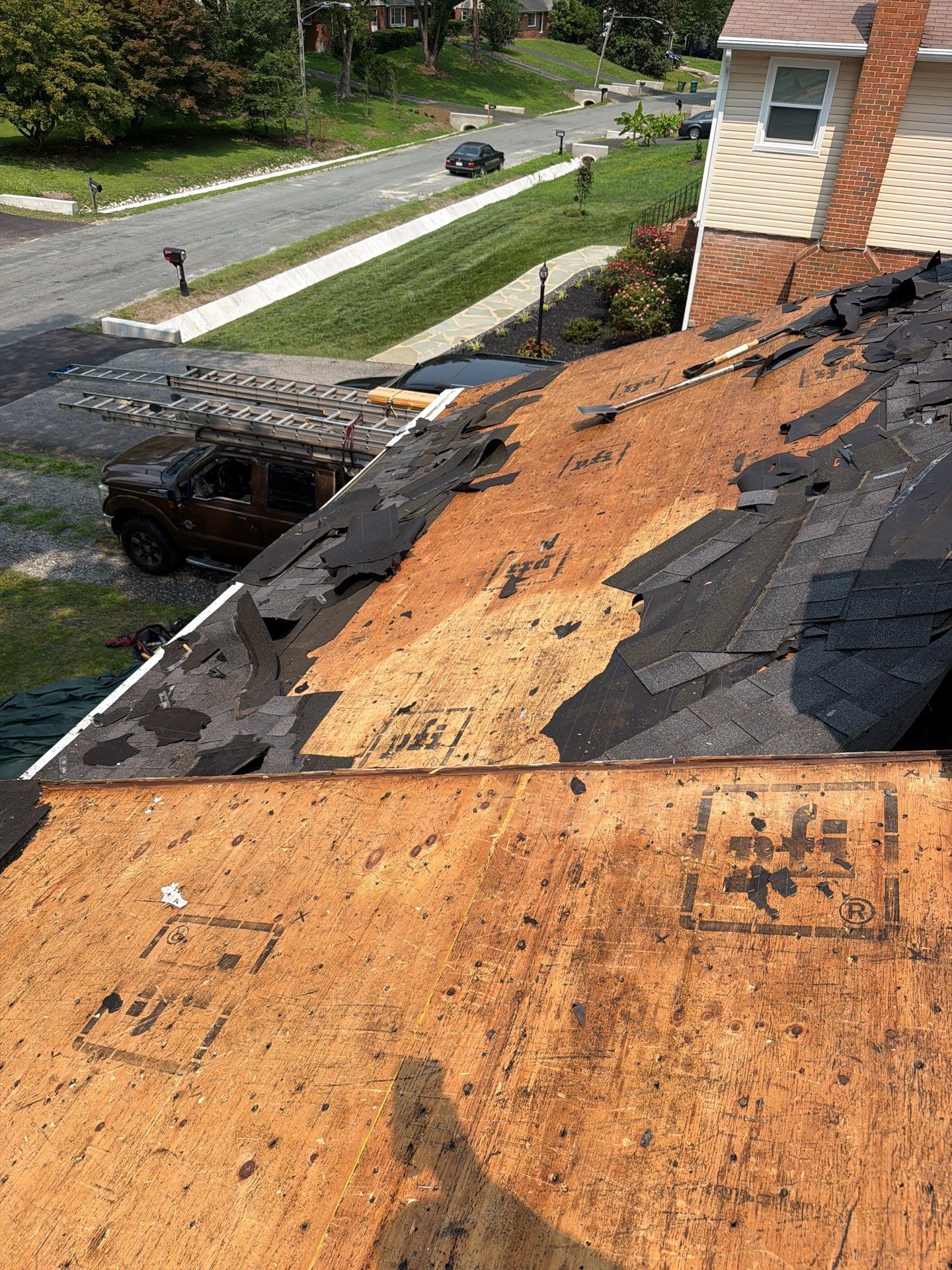 Asphalt Shingle Roof Replacement and Gutter Installation in Richmond by Cade Construction