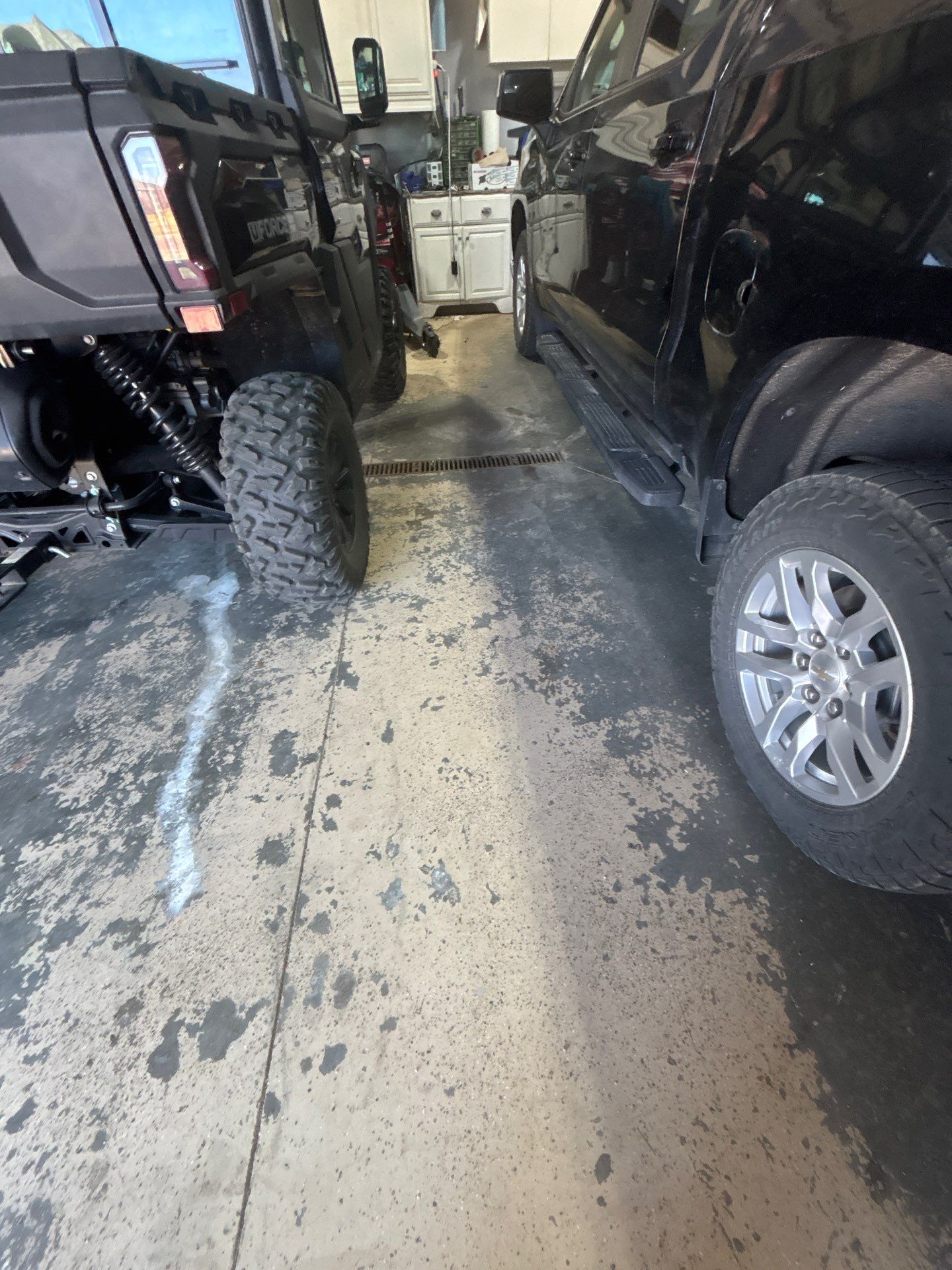 Full Garage Floor Epoxy Coating Installation in Dell Rapids by Select Painting, Coatings & Garage Cabinets