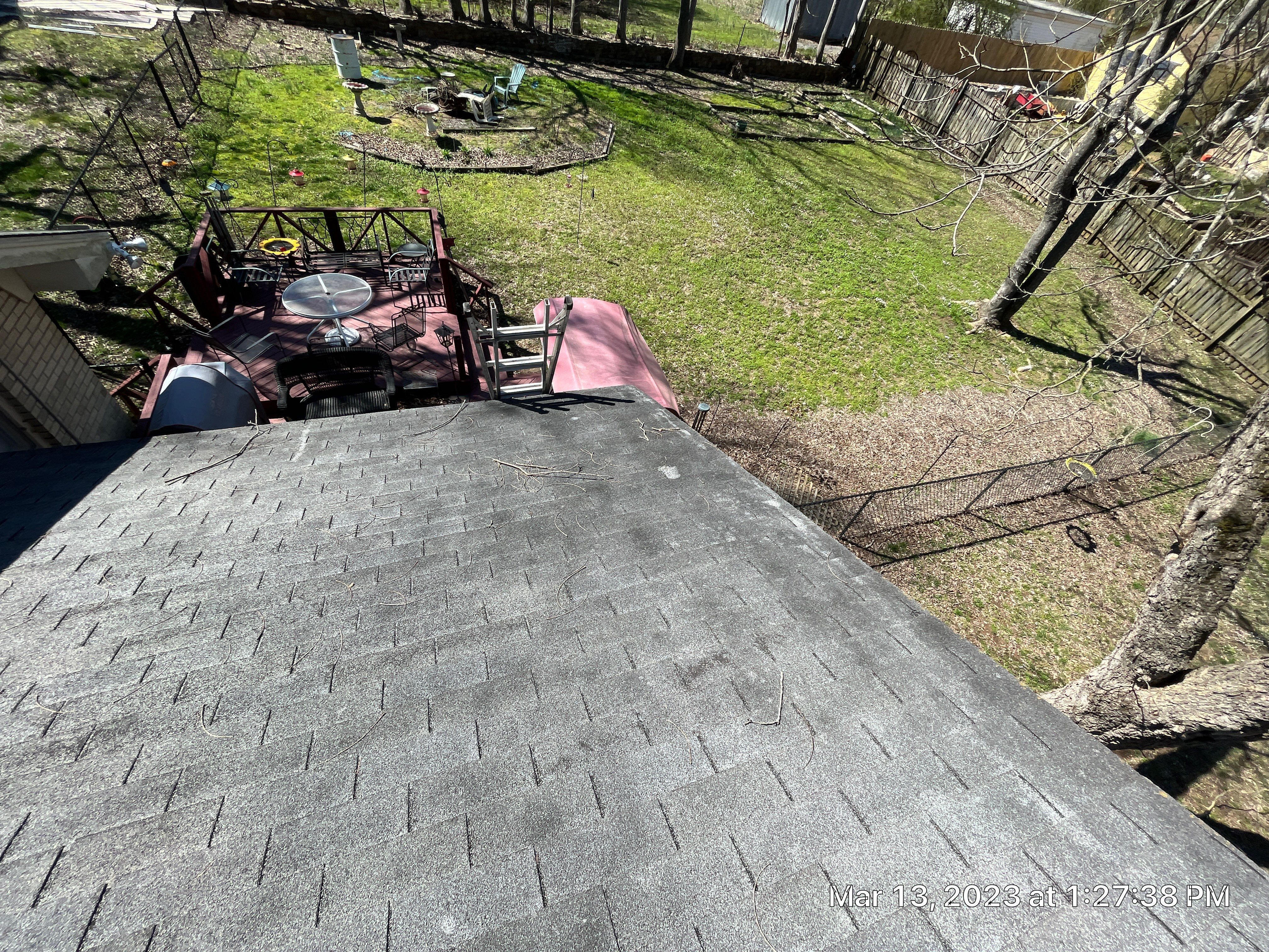 Residential Roofing Installation using 26 Gauge Colored Panels by Hostetler Roofing