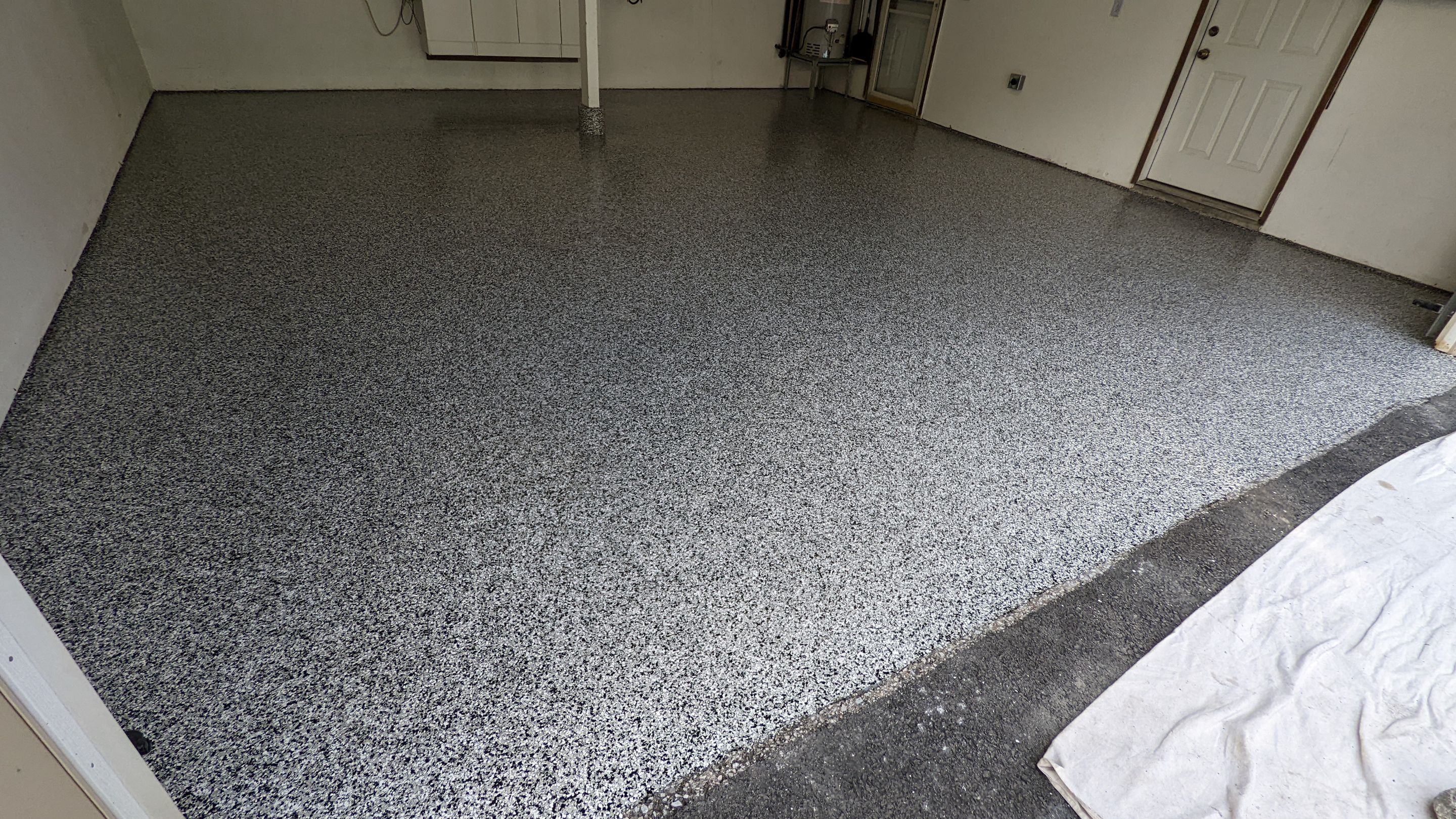 Garage Transformation using Domino for Garage and Pecan for Pool Deck by Croc Coatings, LLC