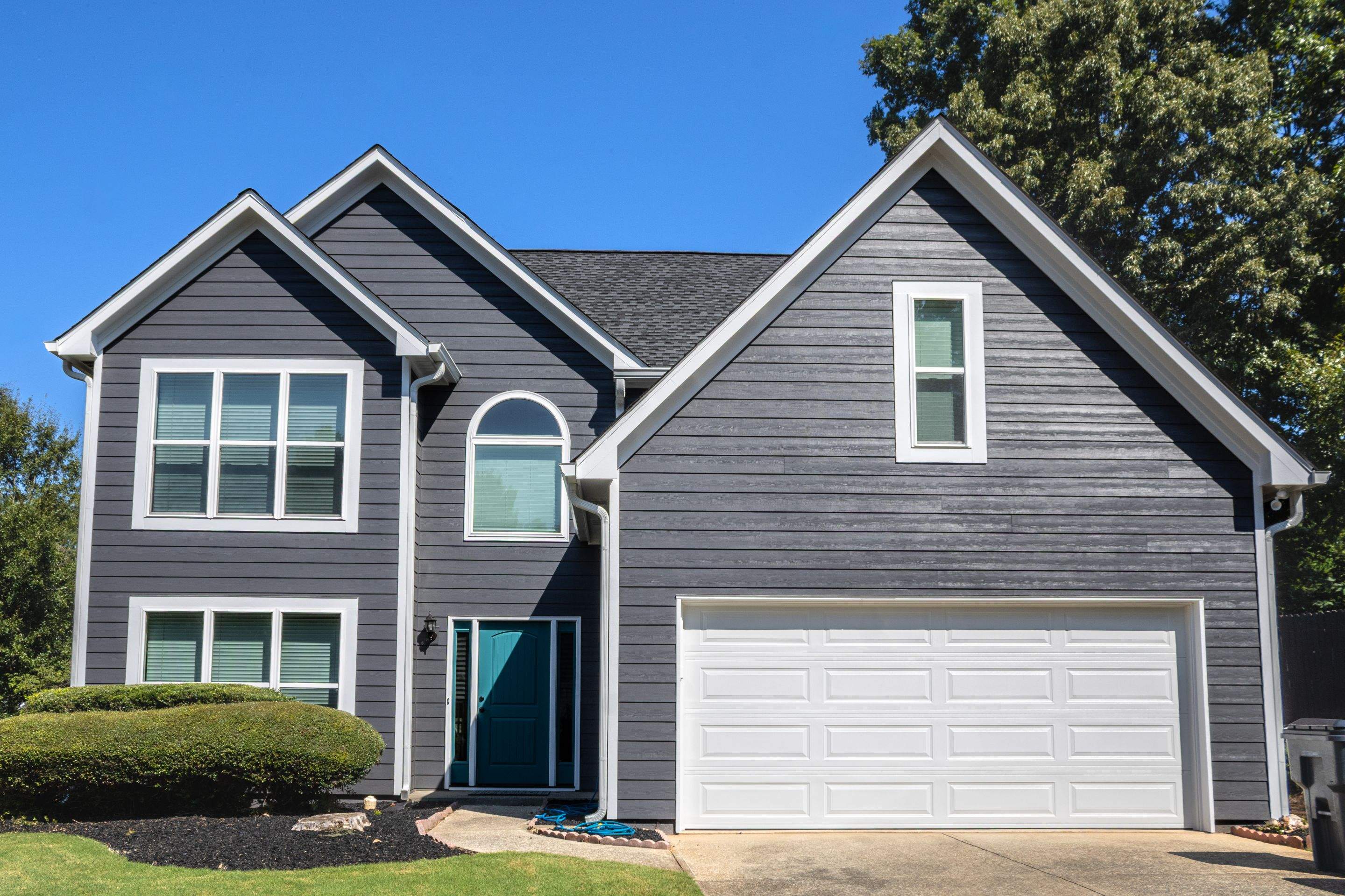 Lawrenceville, GA Full Siding Replacement, Exterior Painting, and Window Installation by Nelson Exteriors 