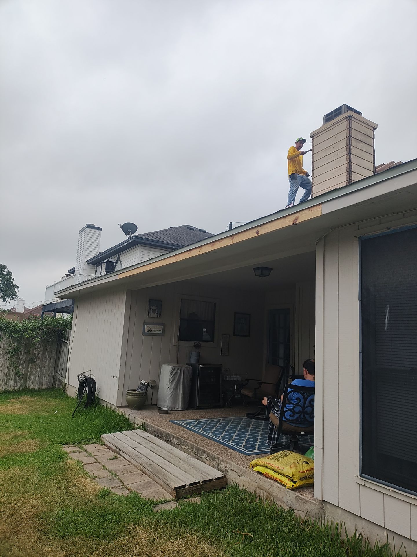 Nothing looks nicer than a little black roof by Bayfront Roofing and Construction
