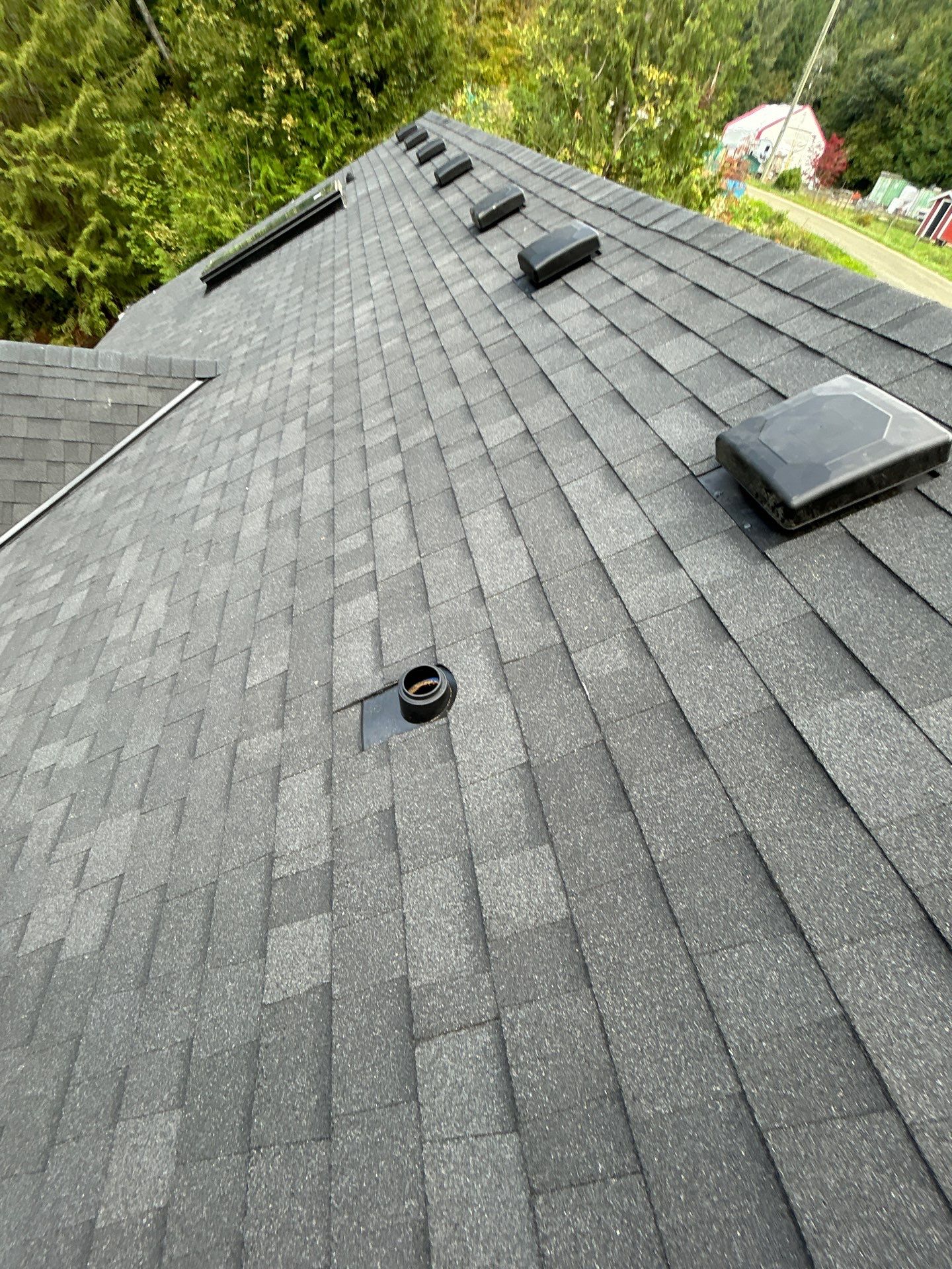 Residential Roofing Installation using OC Oakridge shingles by Top Notch Roofing Inc
