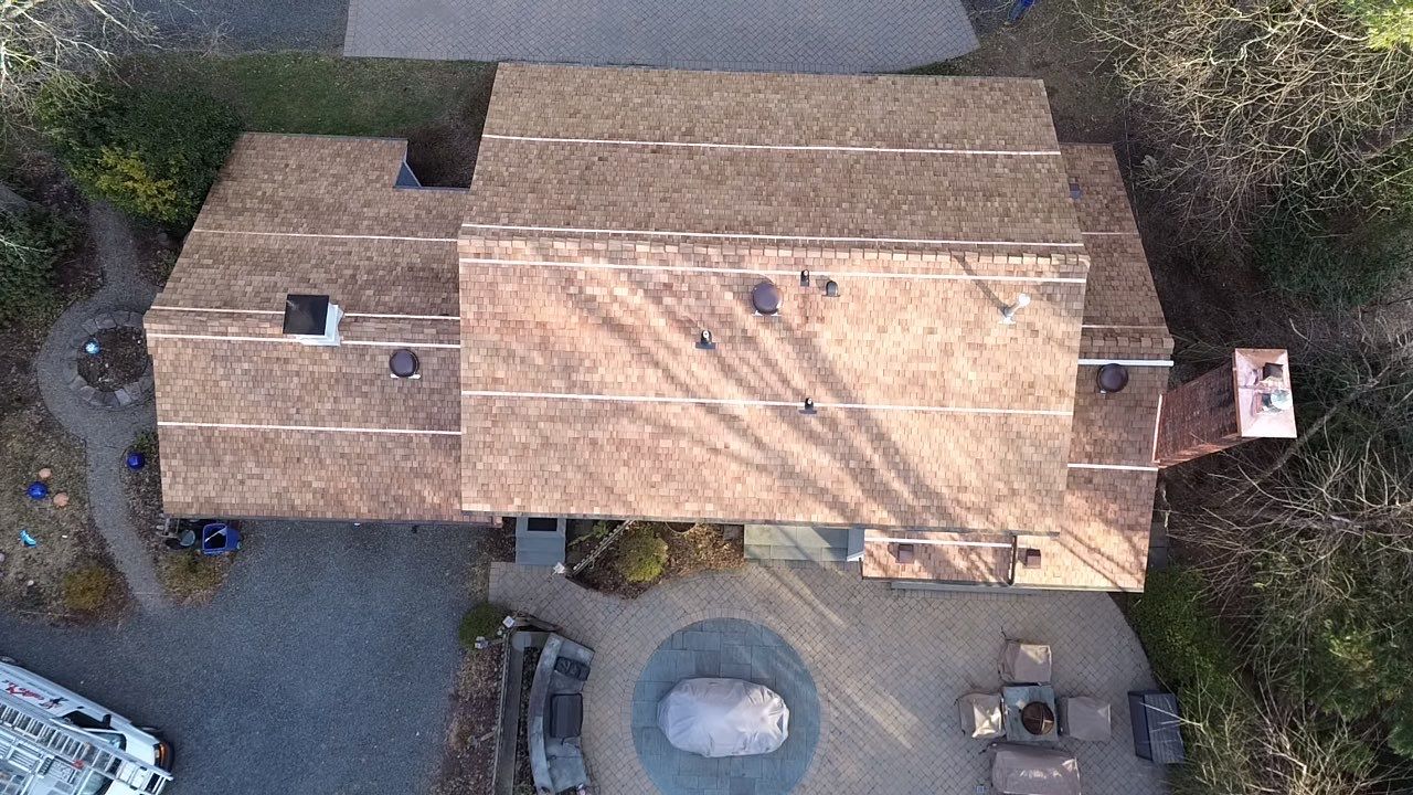Roof Replacement using Cedar Shakes by CMNG LLC