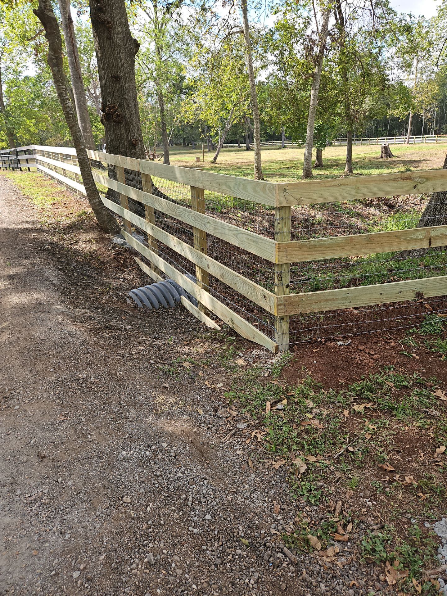Ranch Style fence Plus Iron installation by Tim's Fences