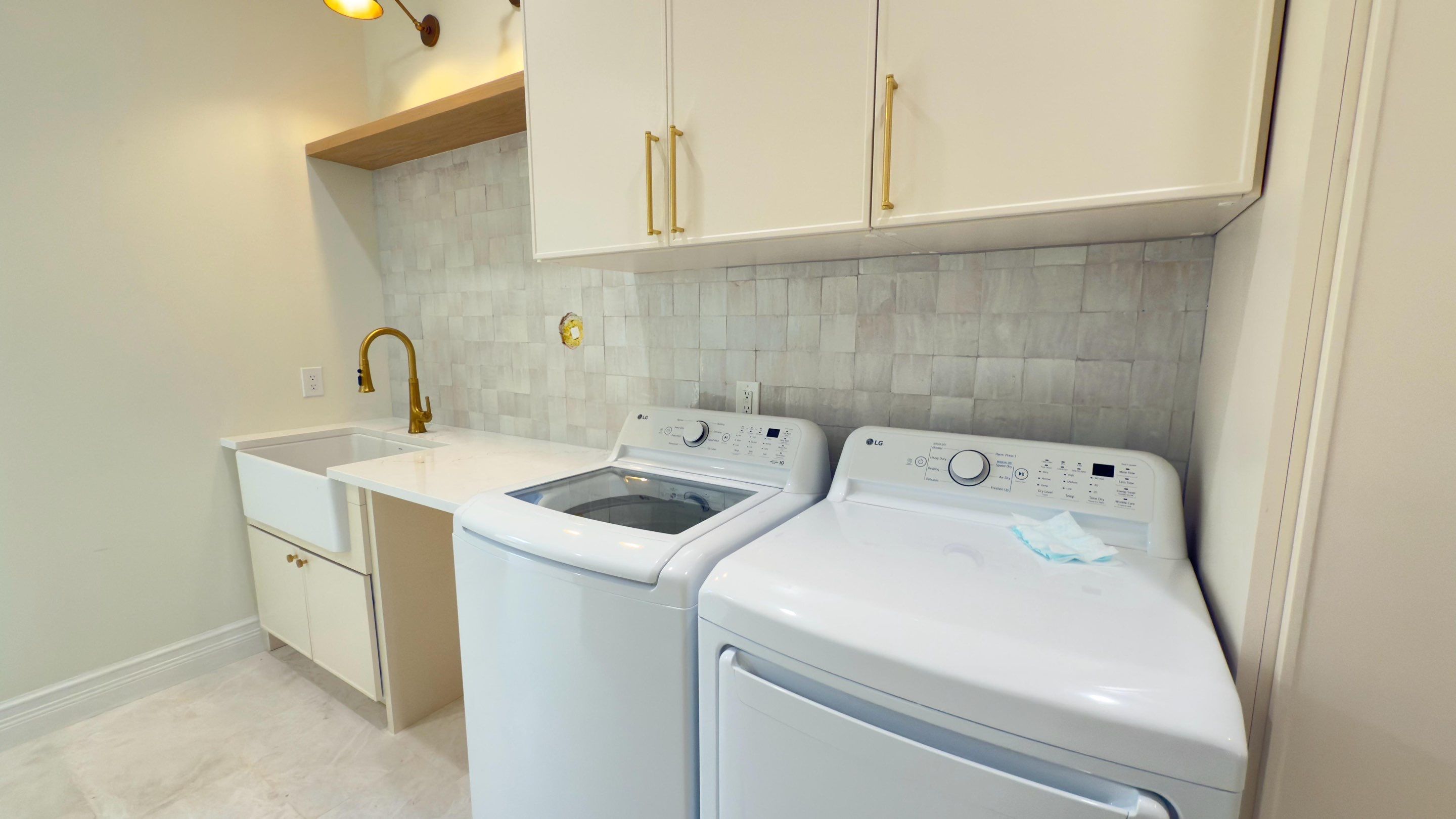 Laundry Room accent wall in Boca Raton by Broward Tile Guys