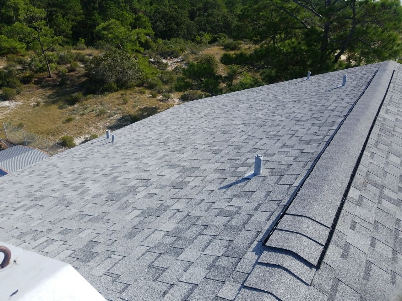 Residential Roofing Installation using Roof Replacement by American Roofing & Construction LLC