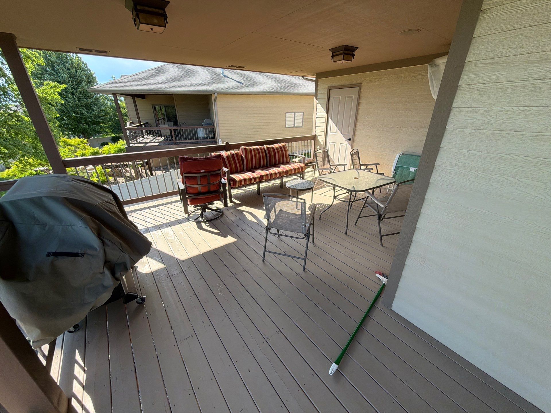 Sioux Falls Exterior Refresh and Multi-Level Deck Maintenance by Select Painting, Coatings & Garage Cabinets