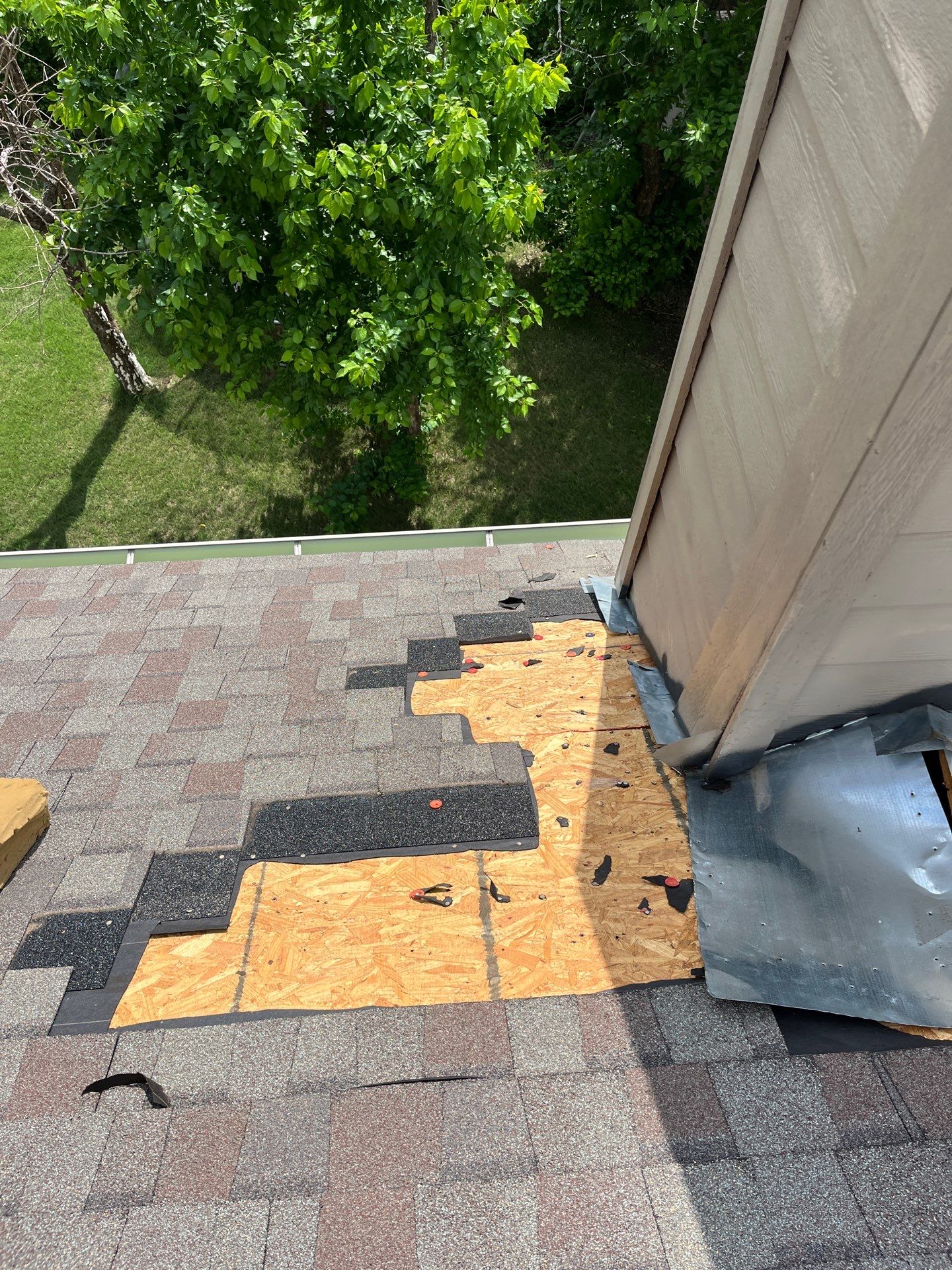Leak Repair (around chimney) by Berry Good Roofing 