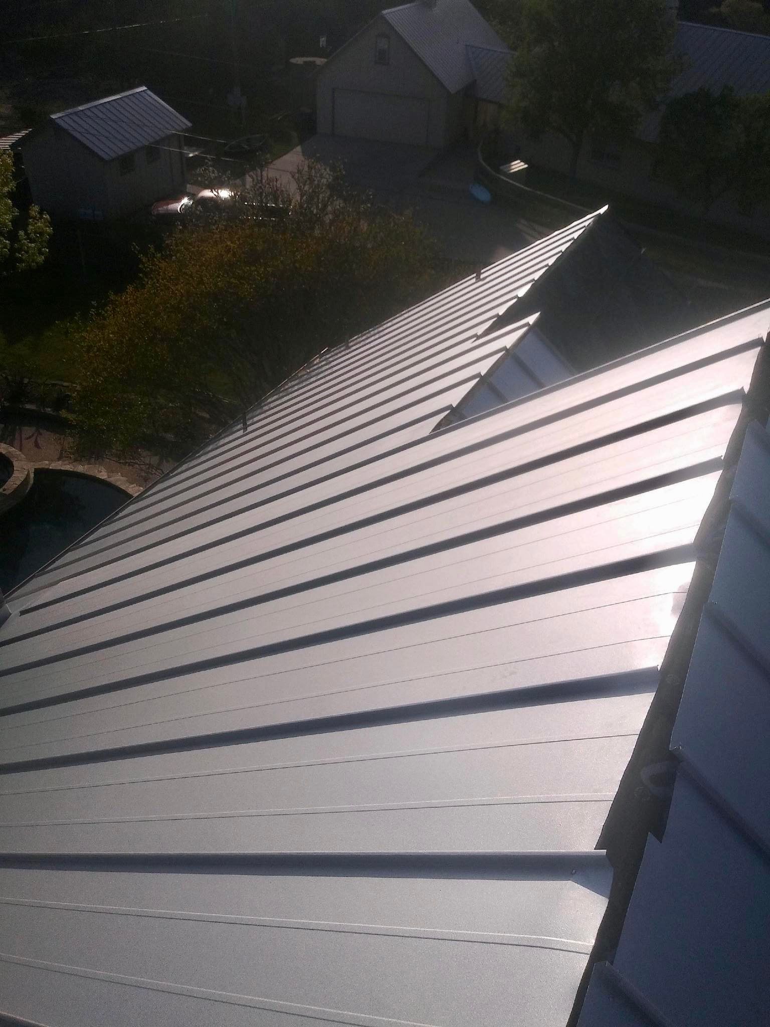 Residential Metal Roof Installation using McElroy Metal by Premier Roofing and Contracting