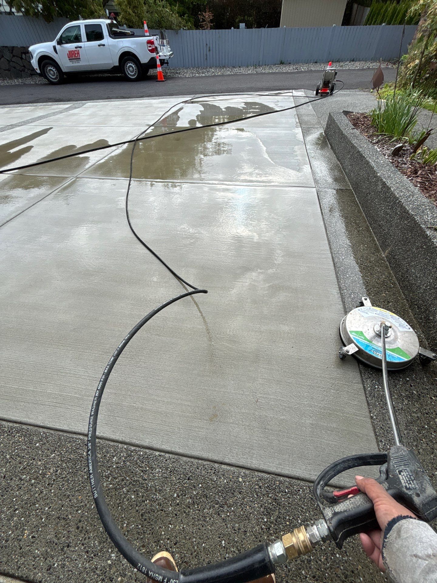 Sealcoated Concrete & Asphalt Driveway | Everett  by Jireh Asphalt & Concrete Inc 