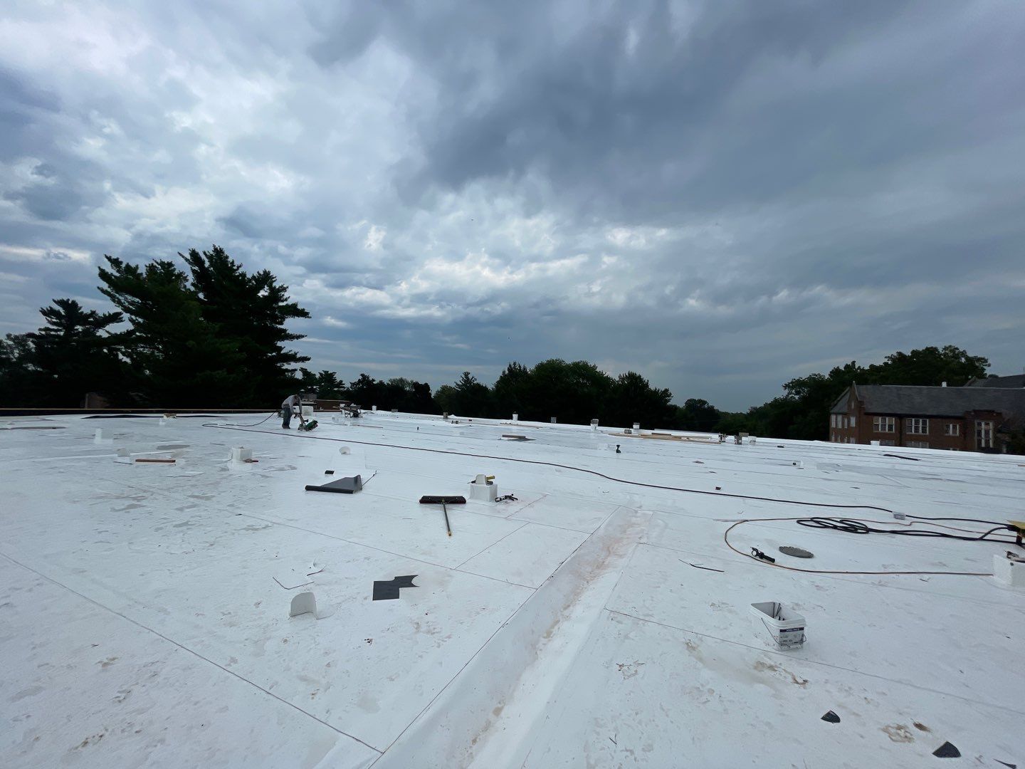 Commercial Flat Roof IB PVC Install  by Titan Commercial & Residential Roofing 