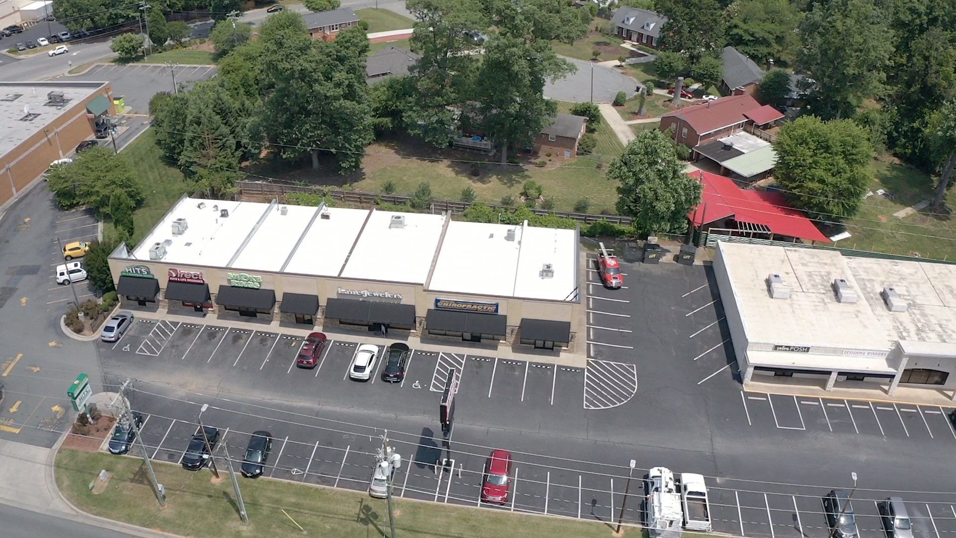 Commercial Roof Coating using Fiberseal basecoat and Silicon Topcoat by Just In Time Roofing and Restoration