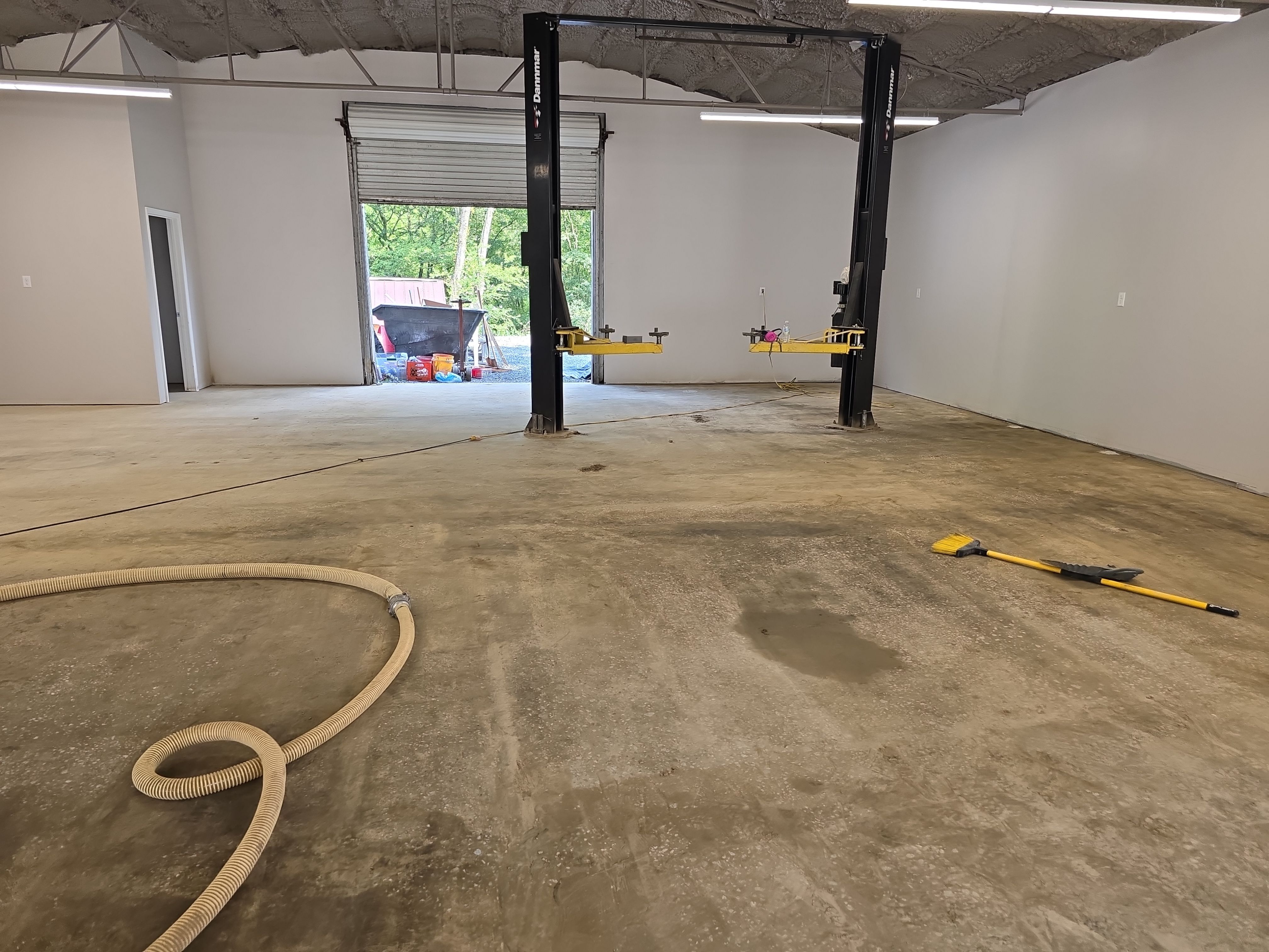 Super old and oily concrete brought back to life by Elite Floor Solutions