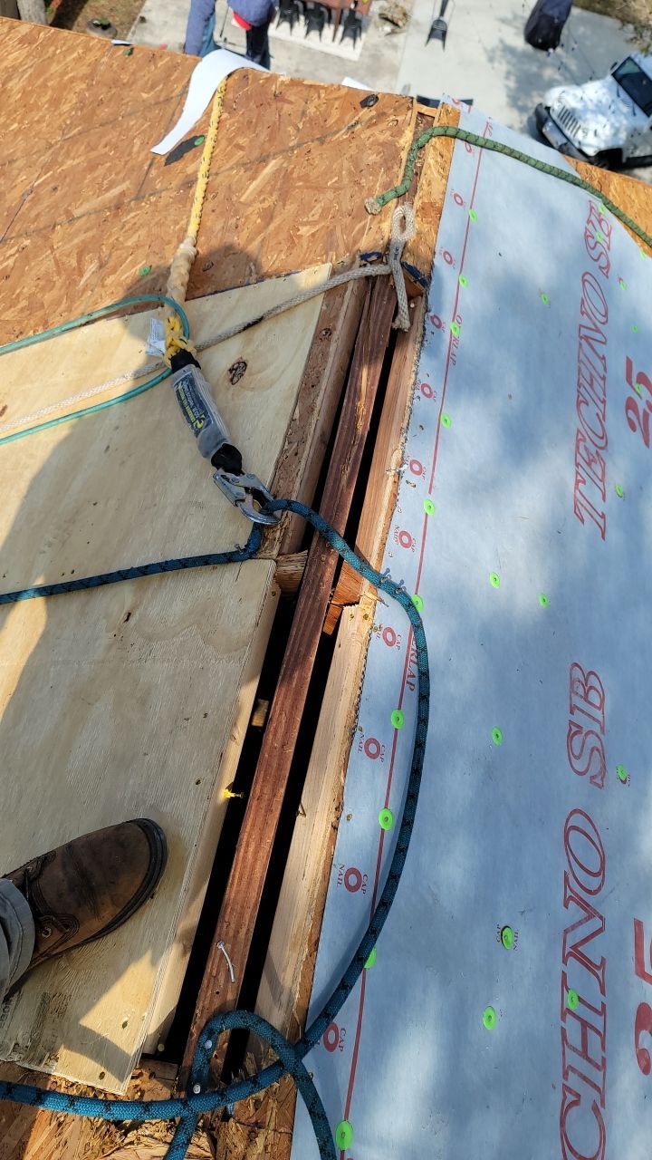 Residential Roofing Installation using Roof Replacement by American Roofing & Construction LLC