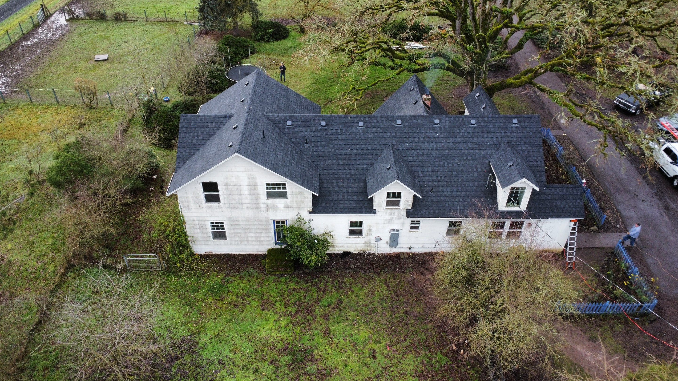 Residential Roofing Installation using IKO Dynasty (Color: Granite Black) by Orezona Building & Roofing Company, Inc.