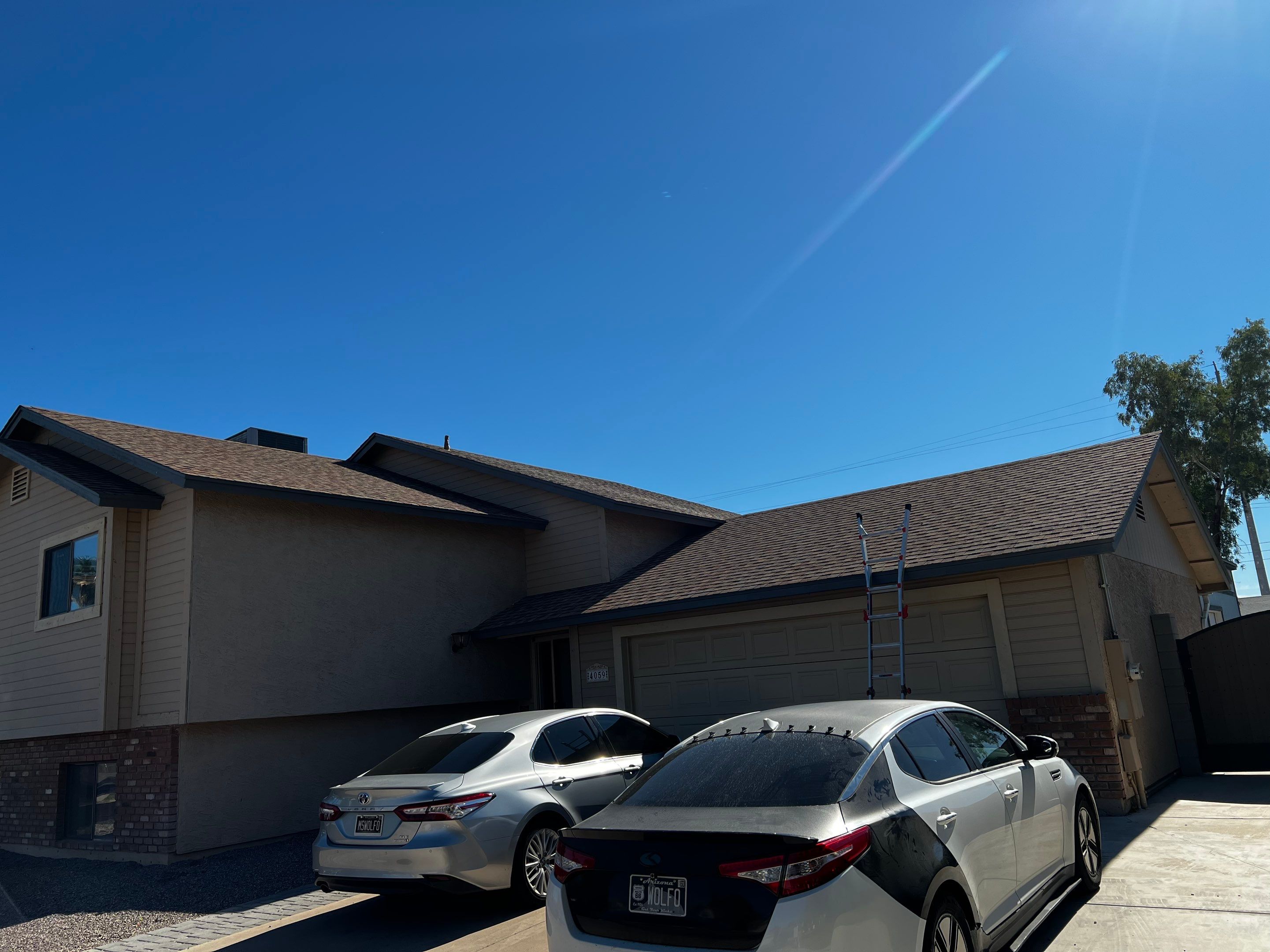 Anne's Full Re-Roof + Shed by All Storm Roofing & Construction