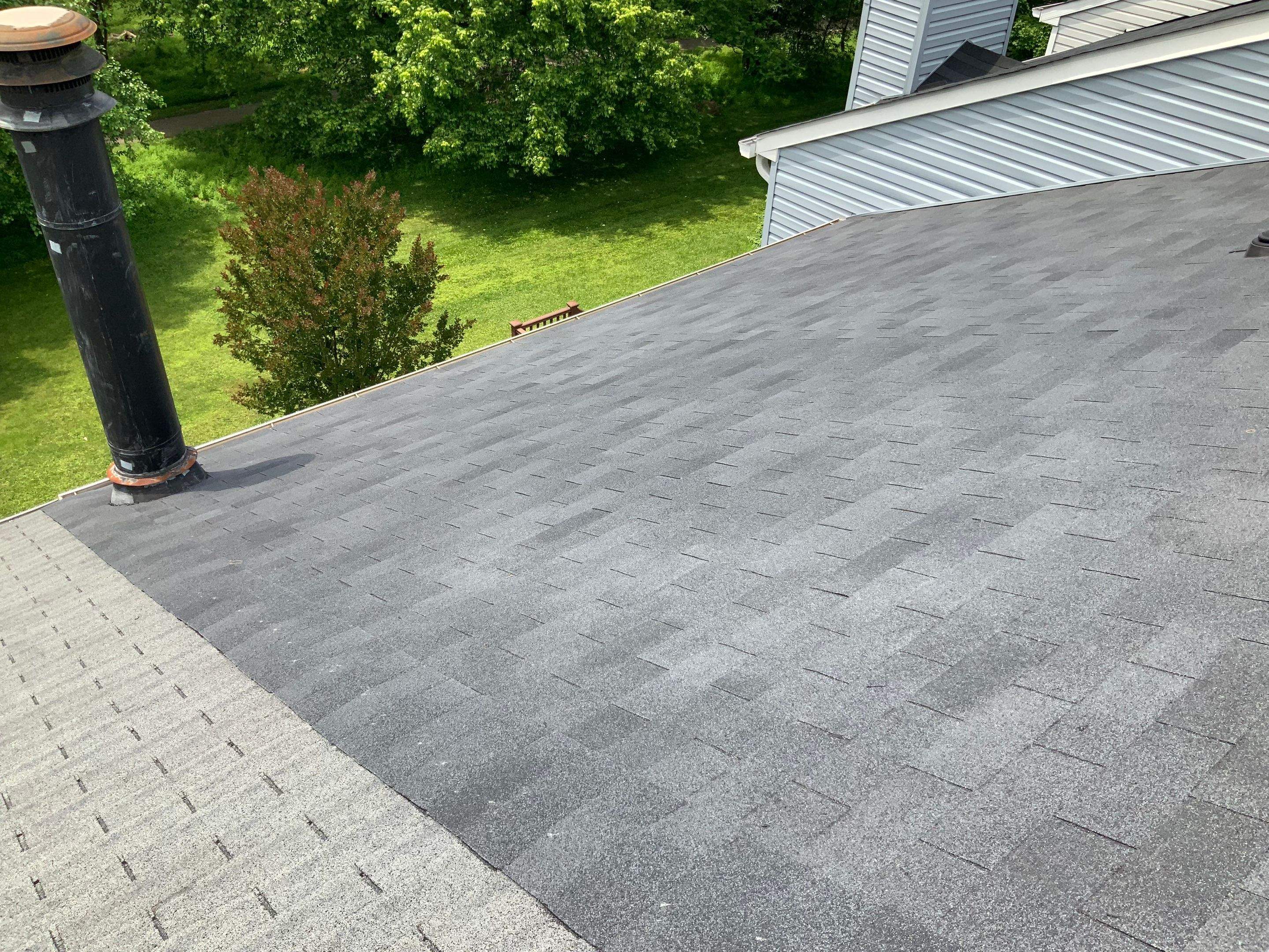 Residential Roofing Installation using XT-25 Color Moire Black by Alpha Design Services