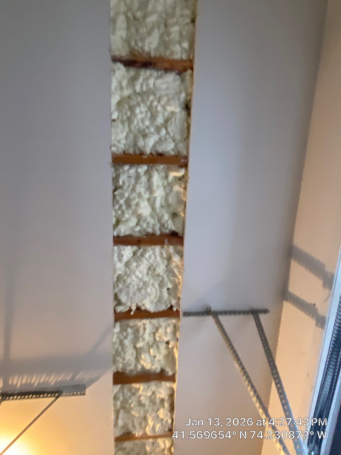 Garage ceiling using open cell spray foam by NYS Foam & Energy