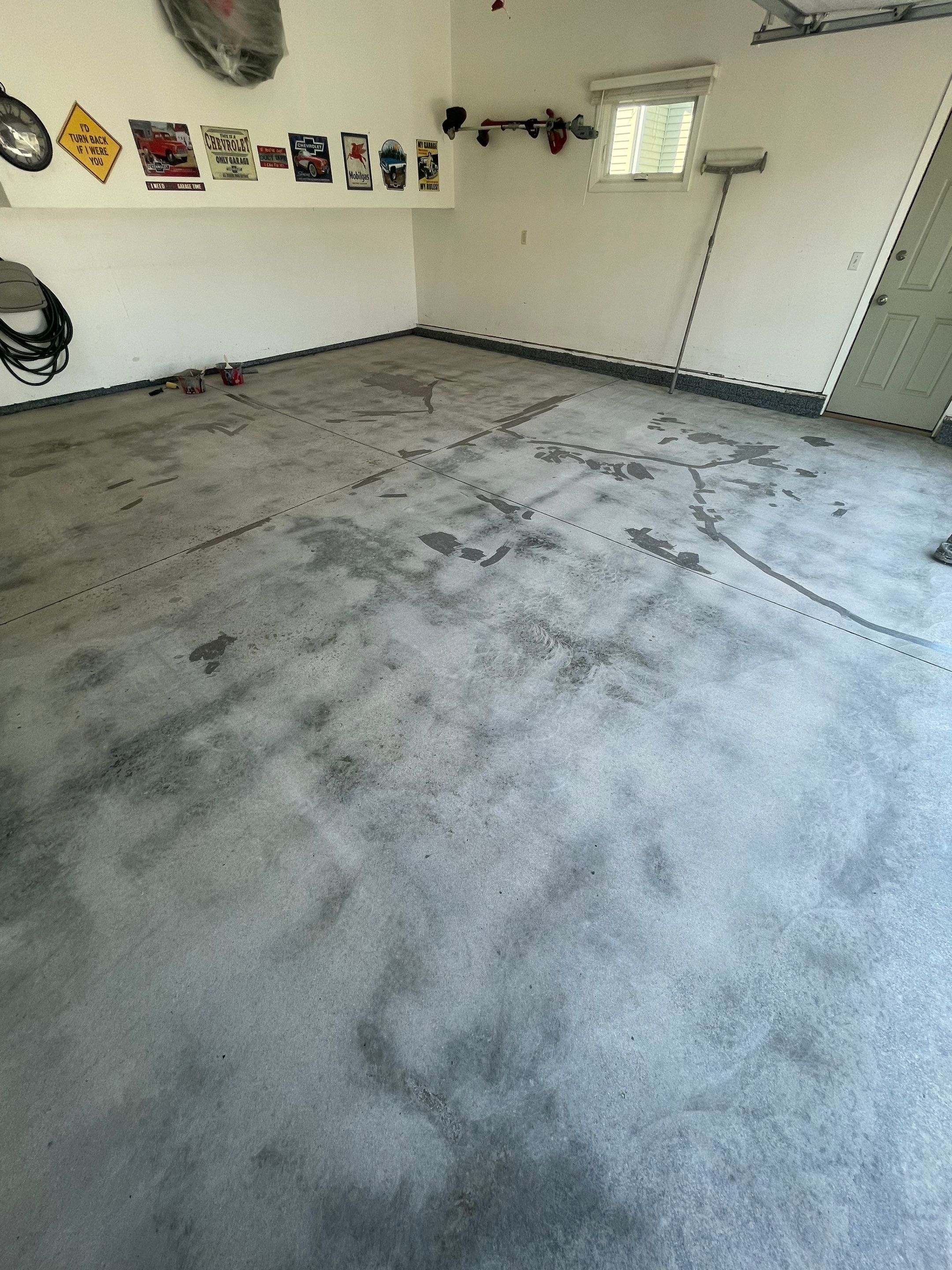 Sioux Falls Garage Floor Coating with Nightfall Decorative Chips by Select Painting, Coatings & Garage Cabinets
