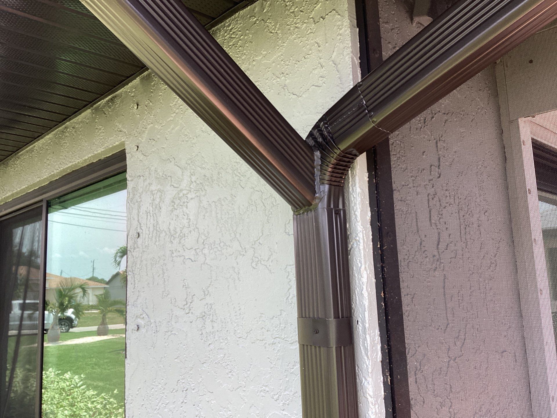 Bronze Seamless Gutters using 6 Inch Seamless Gutters in Cape Coral by Gutter Professors