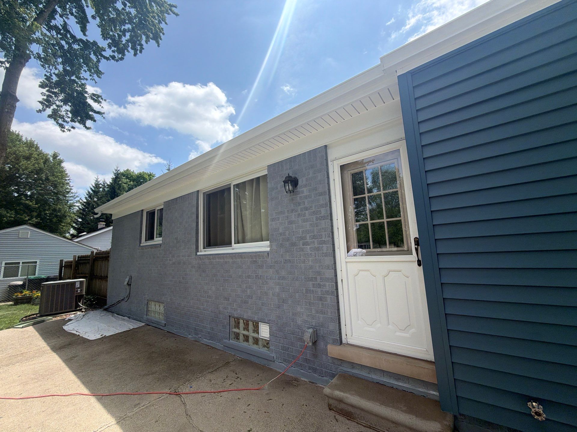 Exterior Brick Staining Transformation by Top Shelf Painter