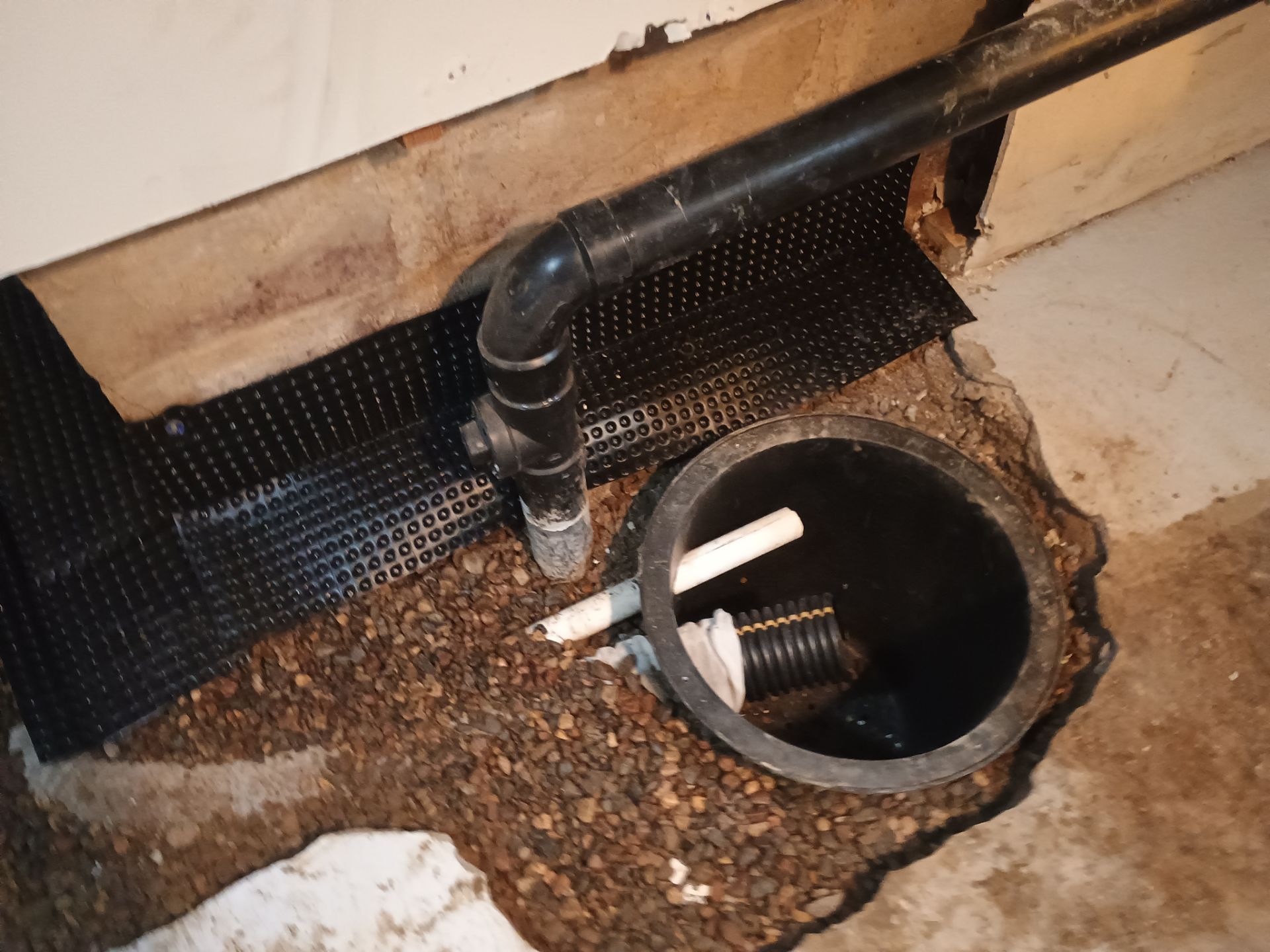 Interior Drain Tile & Sump Pump Installation in St. Paul, MN by Waterproofing Northeast