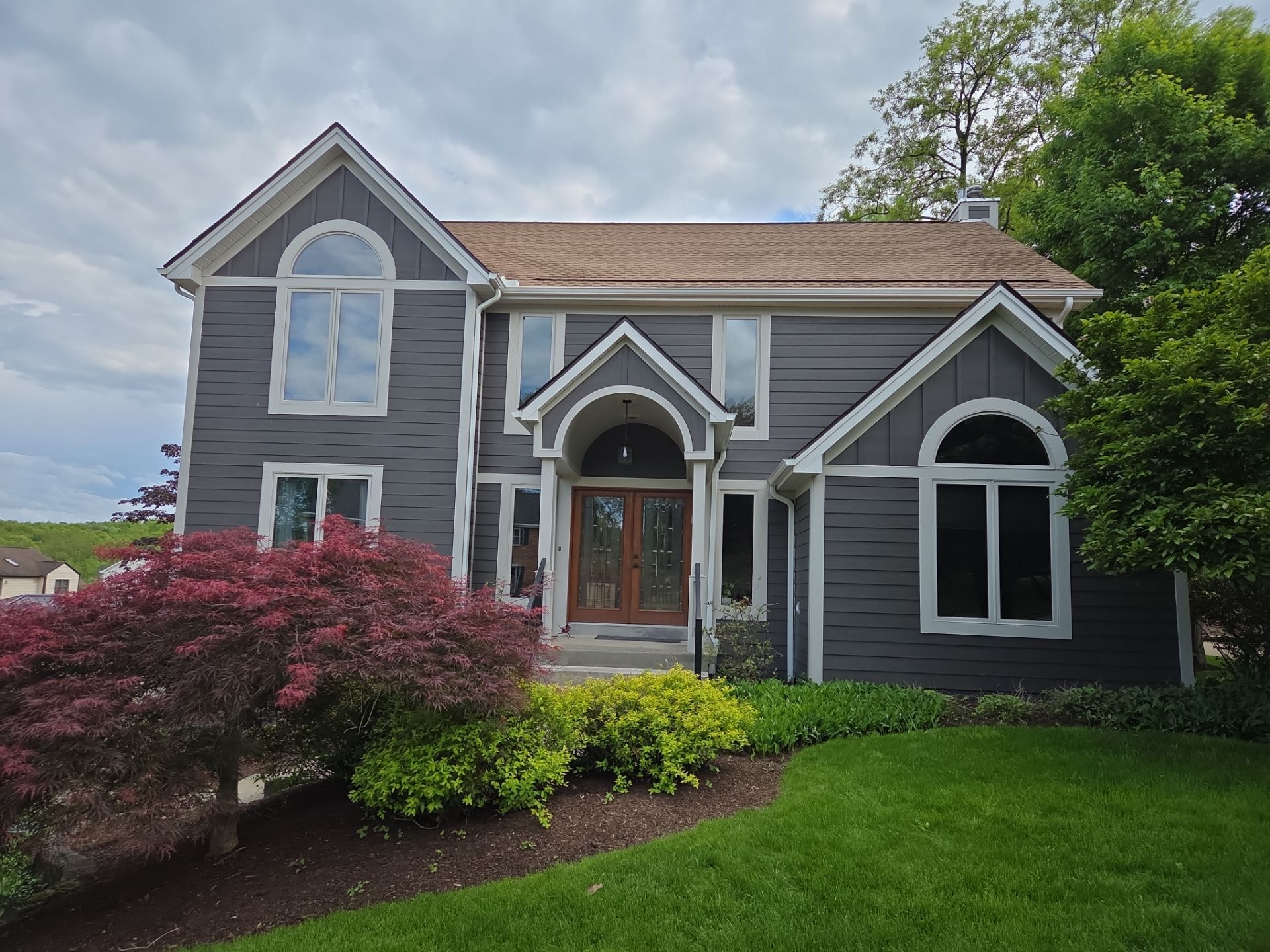 Full exterior remodel by Cousins Roofing Siding & Decks