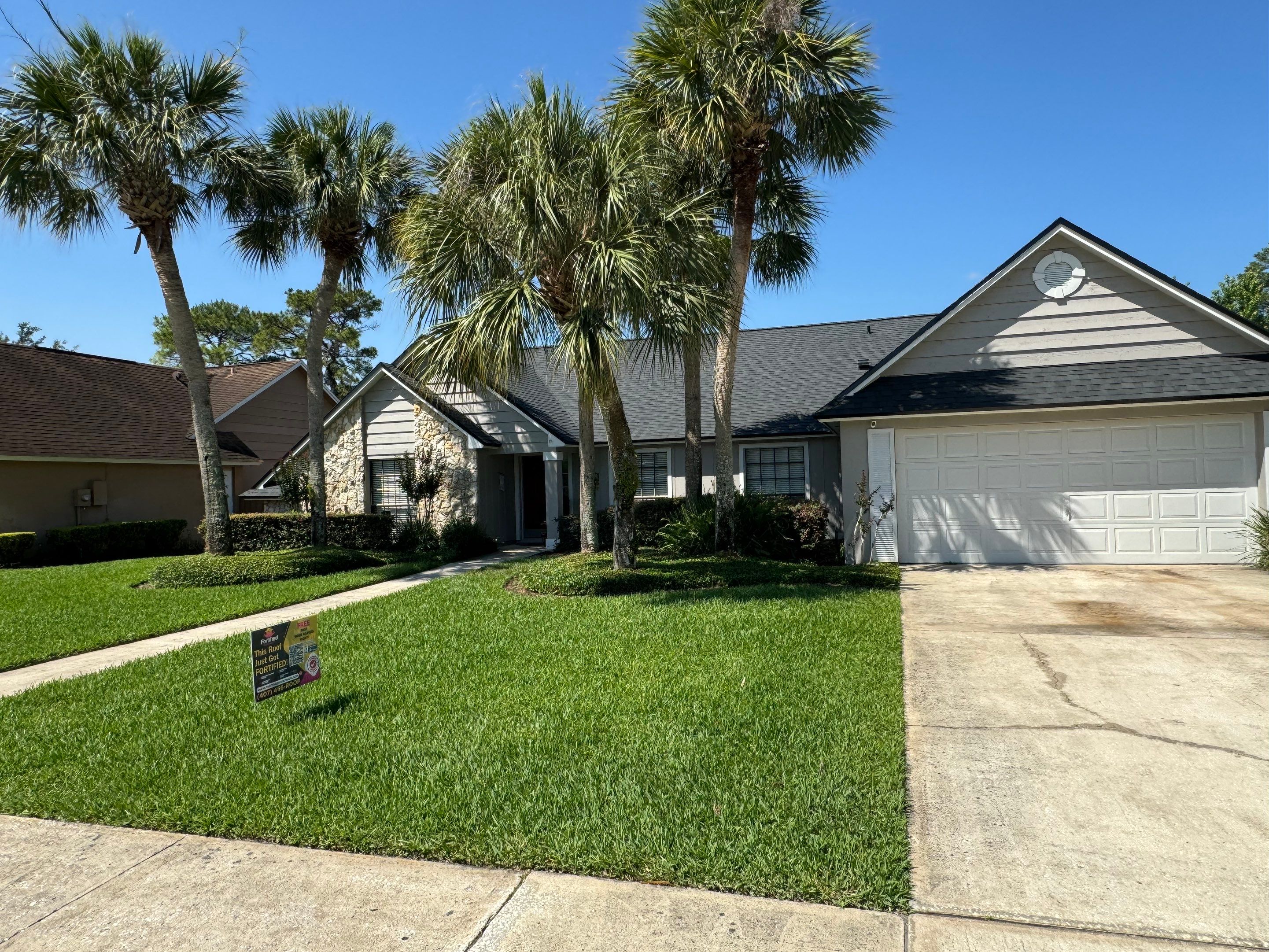 Asphalt Architectural Shingle Roof Replacement and Solar Integration in Longwood by Fortified Roofing Solutions Corp.