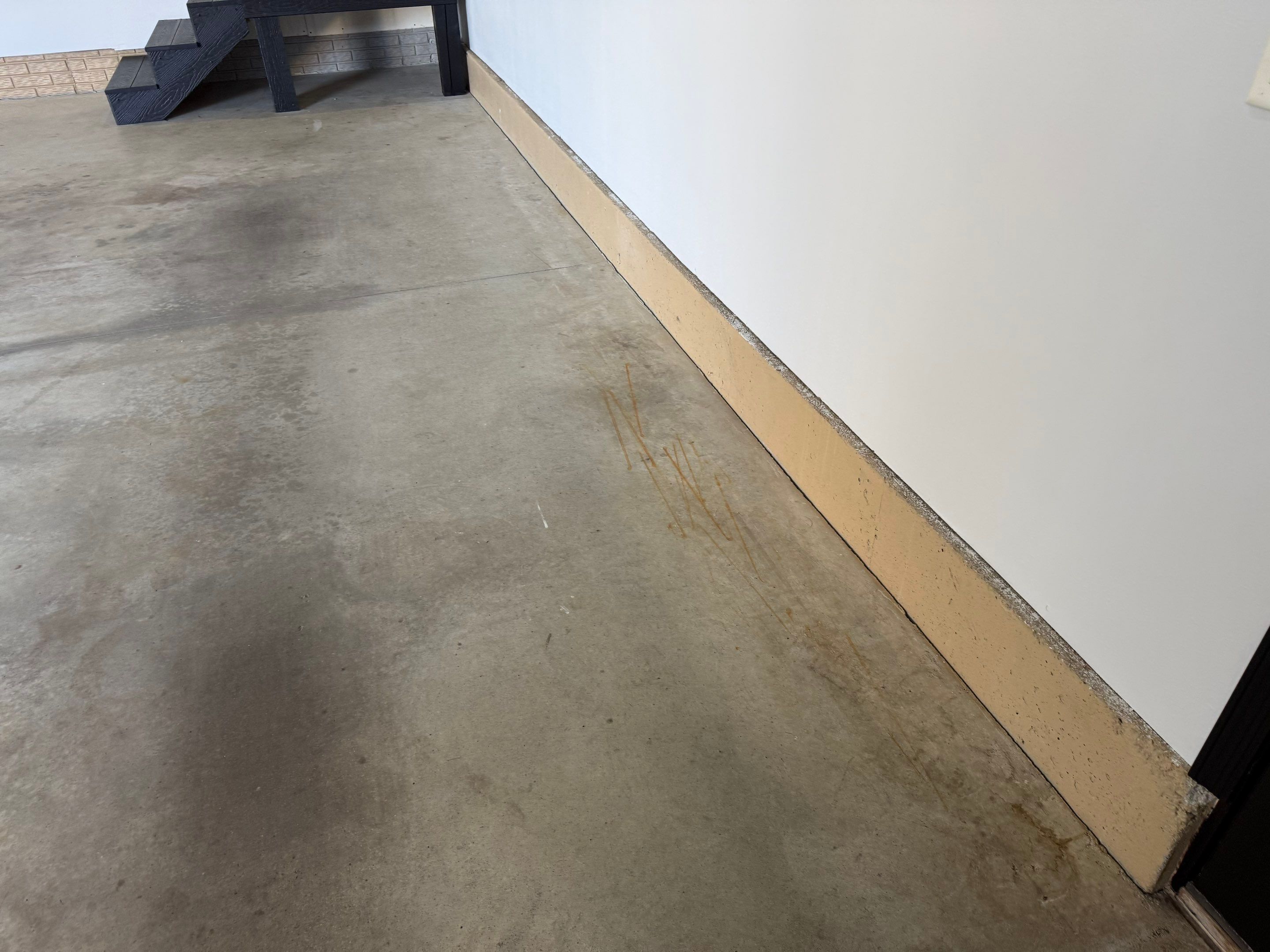 Multi-Car Garage Epoxy Floor Coating in Beresford by Select Painting, Coatings & Garage Cabinets
