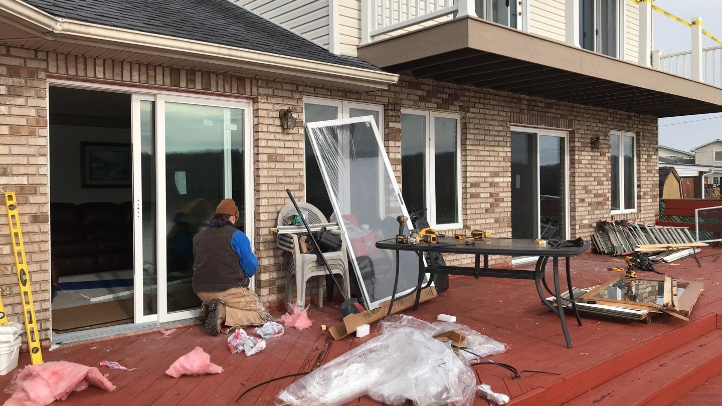Deck Refurbush and Door Replacement using Trex Decking and Railing. Polaris Patio Doors by Secure Construction Company Inc