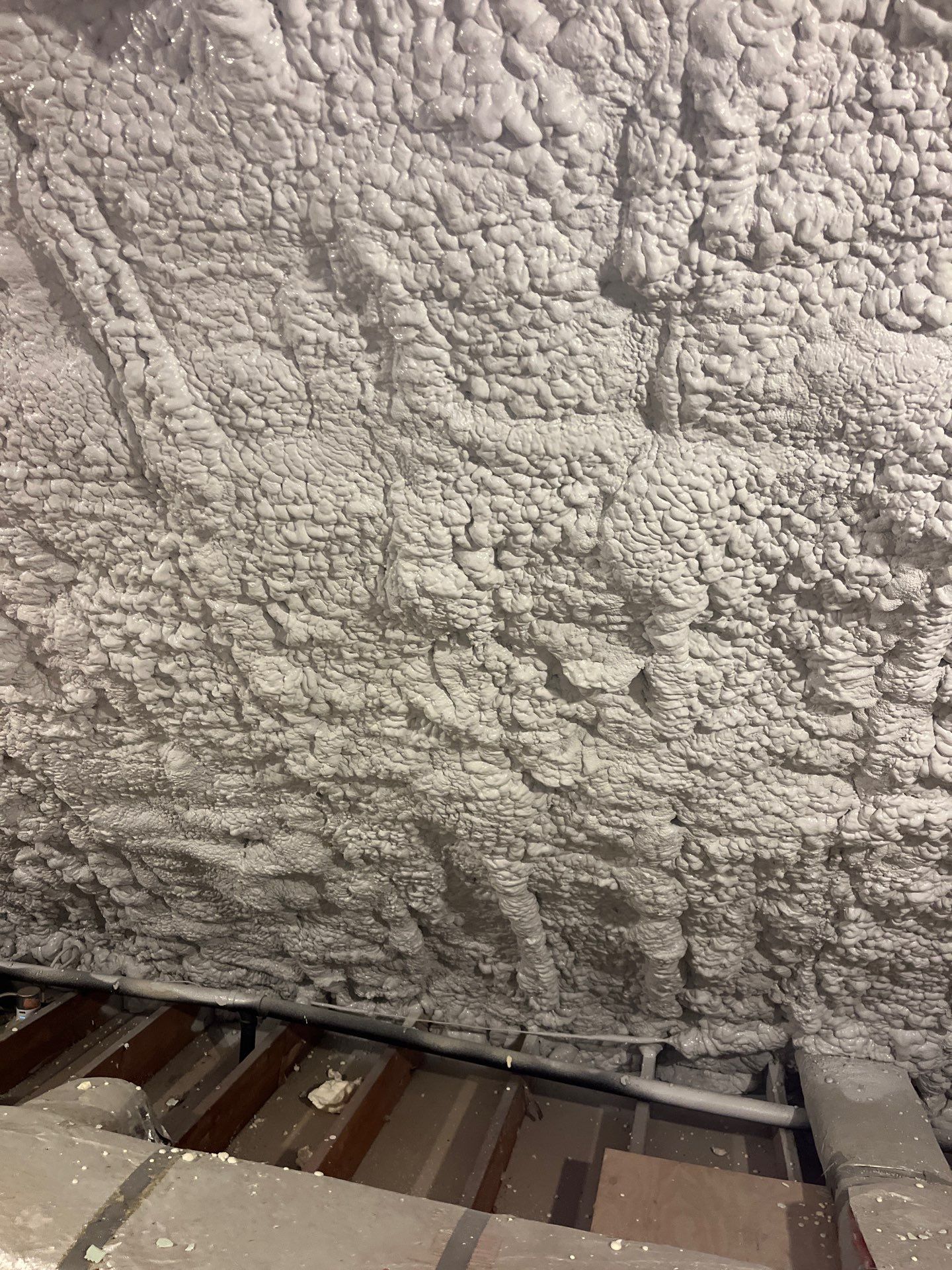 Attic Retrofit using open cell spray foam by NYS Foam & Energy