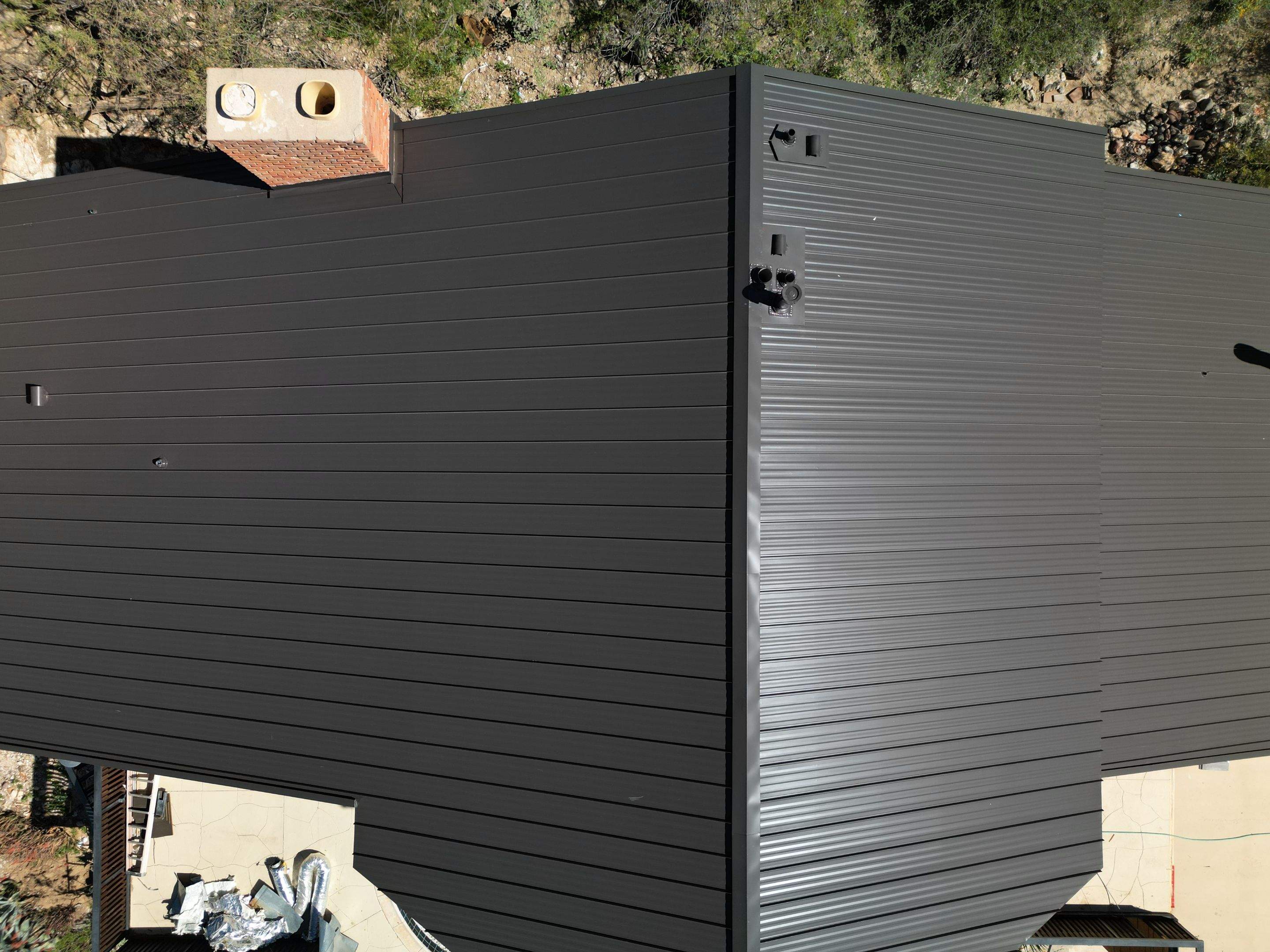 Burnished Slate Standing Seam by Reimagine Roofing