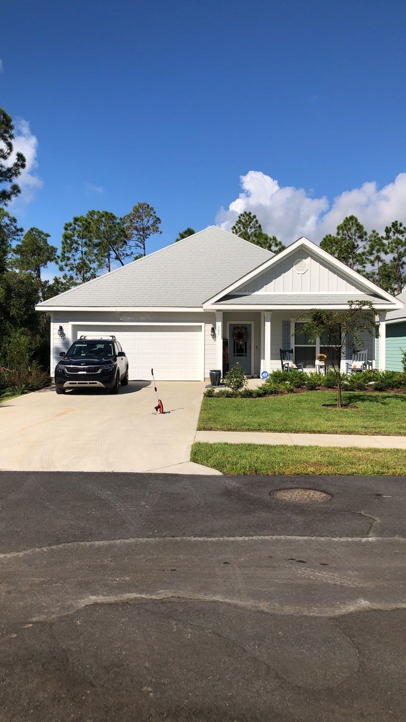 Seamless Gutter Installation using White by Gutter Professors