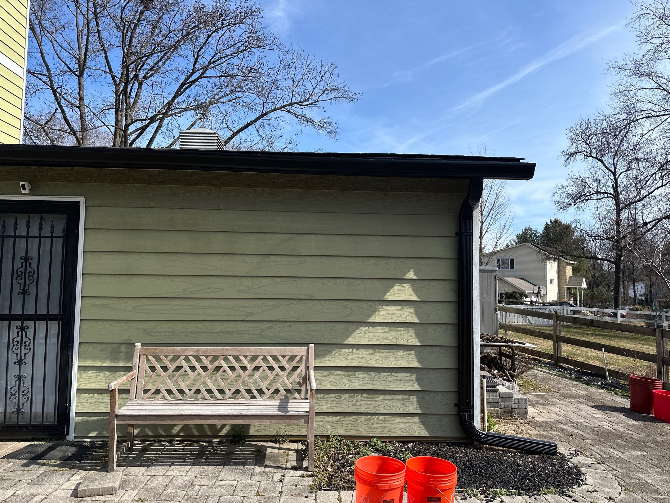 Blacked Out Gutters / Gutter Guards by American Home Contractors
